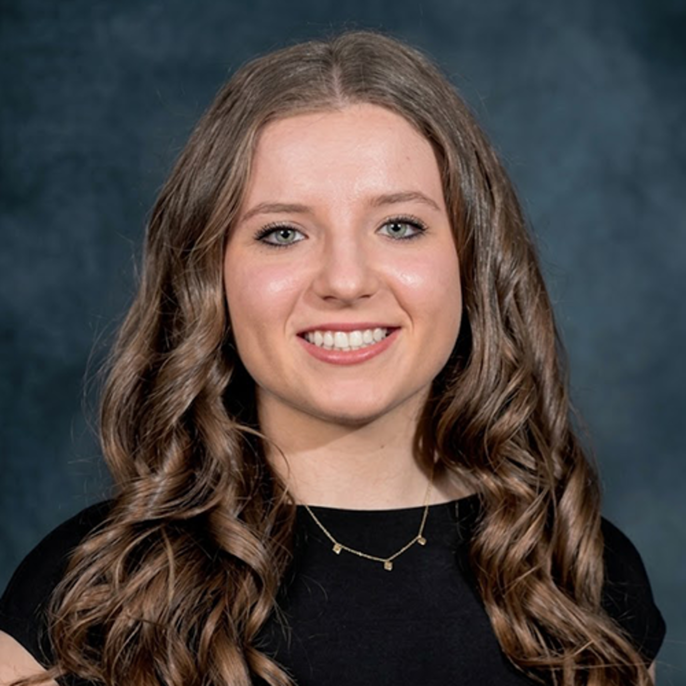 Headshot of Diana Strama wearing professional attire.