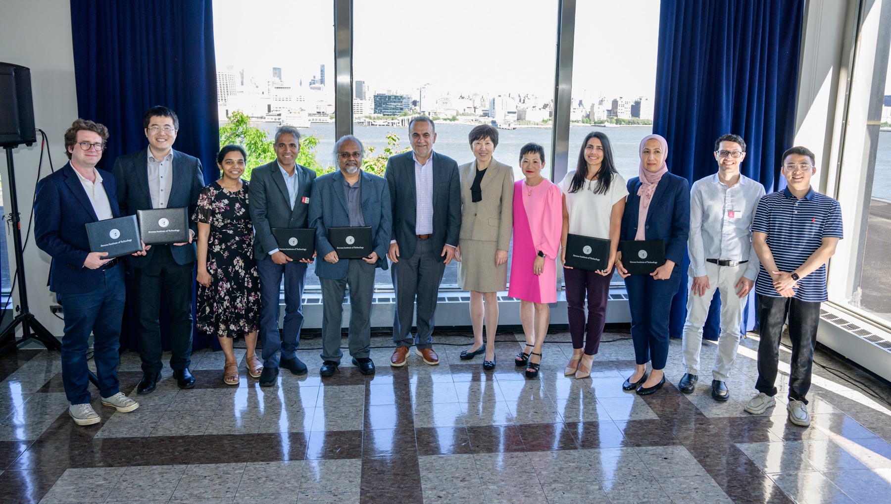 Faculty members Igor Pikovski, Yi Bao, Santhi Sri Billapati, Sarath Chandra Kumar Jagupilla, Dibs Sarkar, Muhammad Hajj, Schaefer School of Engineering and Science Dean Jean Zu, Jennifer Kang-Mieler, Antonio Zaferiou, Sally Shady, Reza Marsooli and Jia Mi