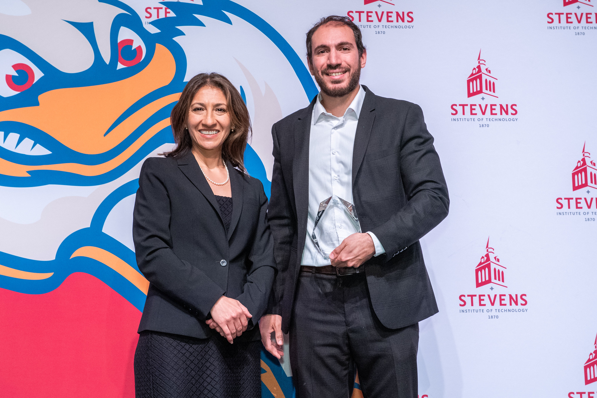 An image of a graduate award presenter and recipient at the 2026 graduate awards ceremony.