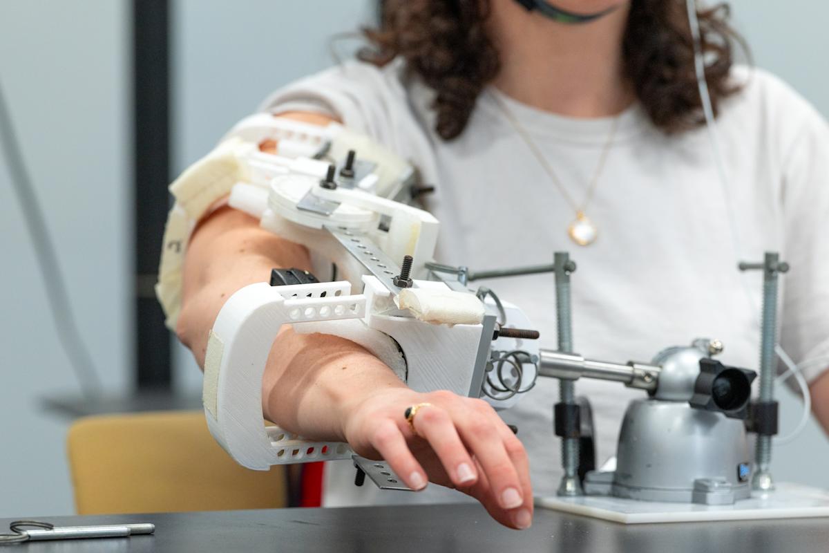 Woman hooked up to neurovascular device.