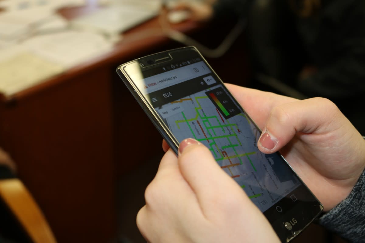Guketlov demonstrates the app on her phone