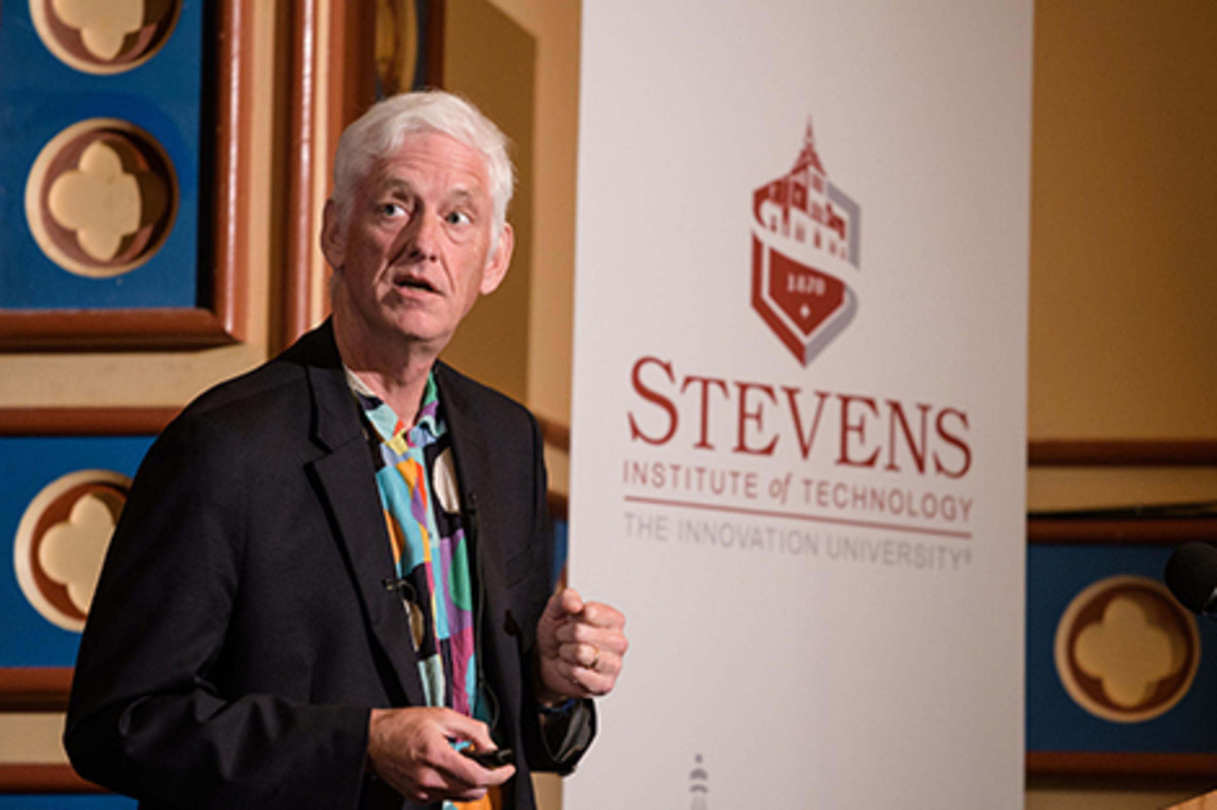 Peter Norvig, of Google, at the podium as he presents a lecture at Stevens.