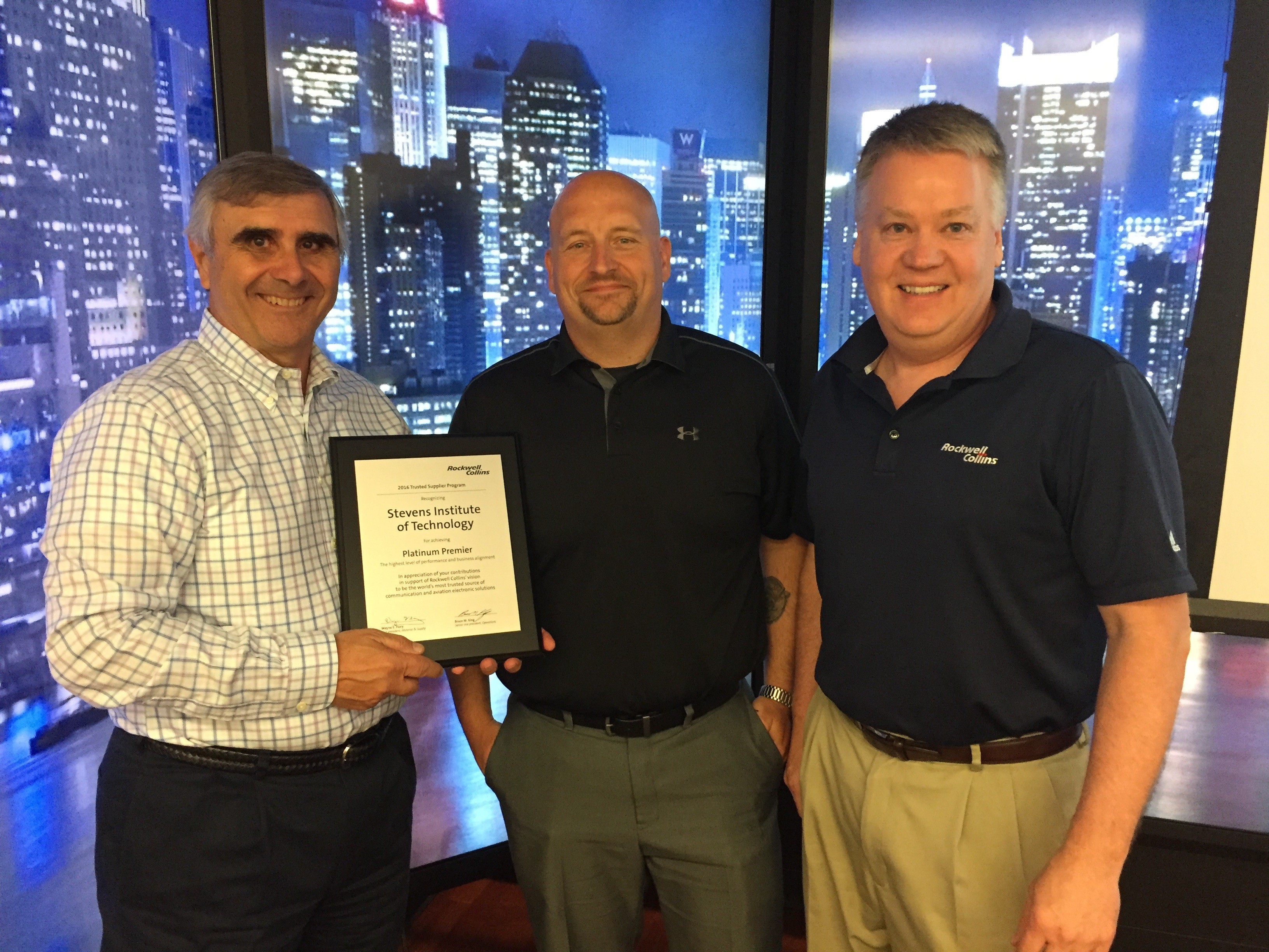 Interim Dean Anthony Barrese receiving Platinum Award from Rockwell Collins on behalf of Stevens Institute of Technology 