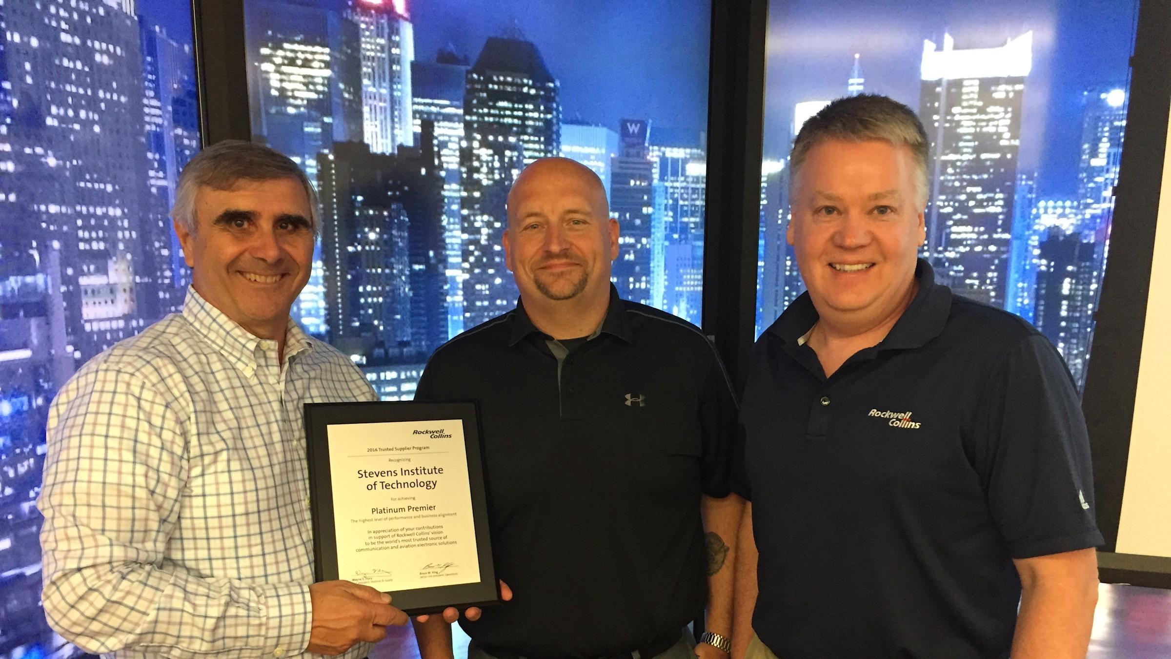 Interim Dean Anthony Barrese receiving Platinum Award from Rockwell Collins on behalf of Stevens Institute of Technology
