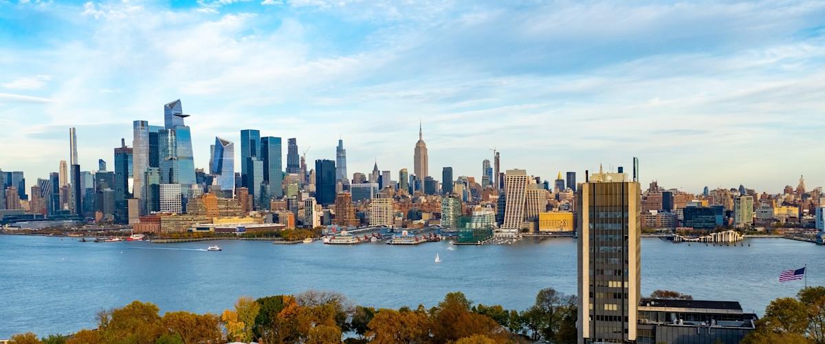 Aerial image of campus with New York skyline in background