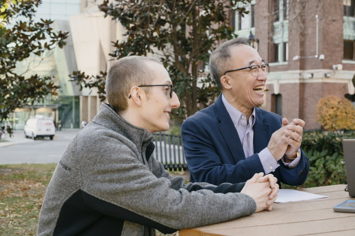 Ph.D. student Jacob Erickson, left, and computer science professor Sam Kim Ph.D. ’05 discuss the academic advantages and features of the Gateway Academic Center.