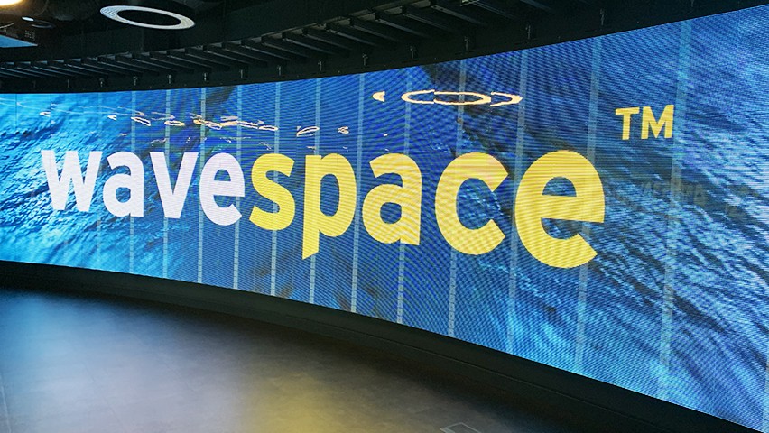 Photo of digital Wavespace sign from EY's Madrid office.