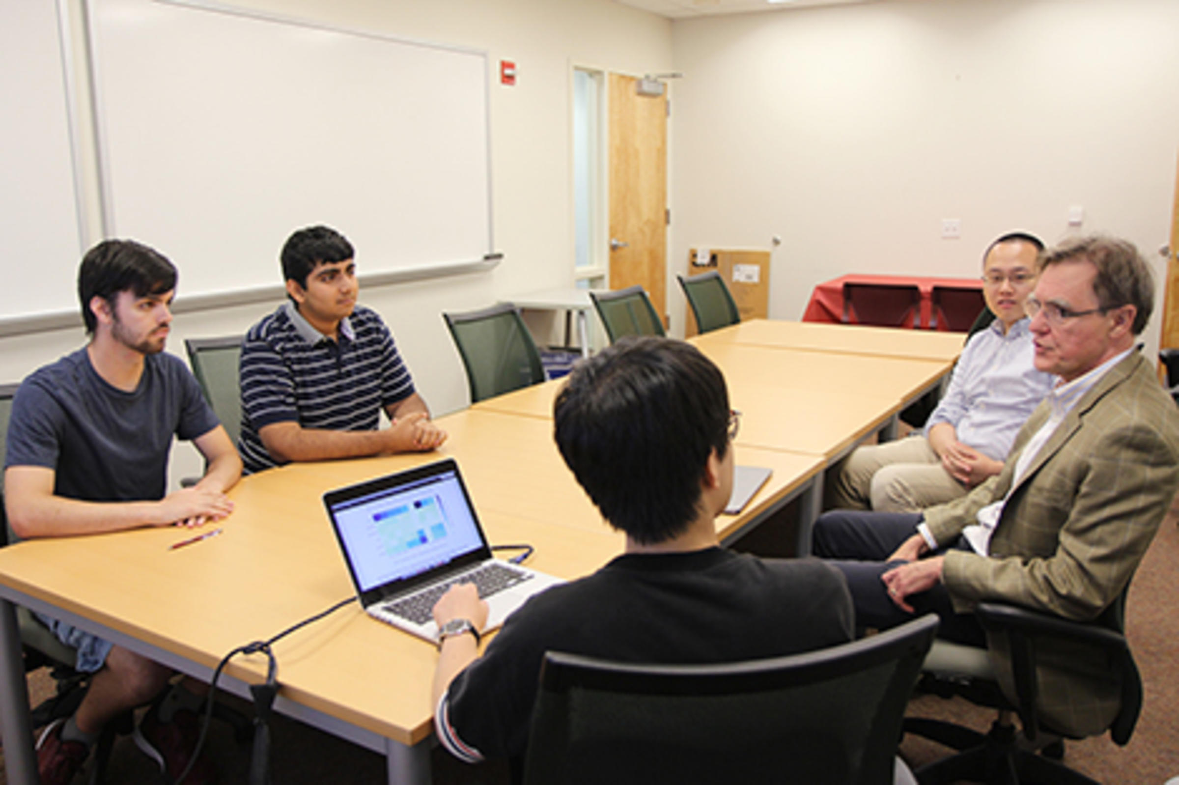 Dr. Jeffrey Nickerson, Dr. Feng Mai, Ph.D. candidate Nico Zheng, and undergraduate students Chris Albano and Neev Vora in the weekly Wikipedia research team meeting.