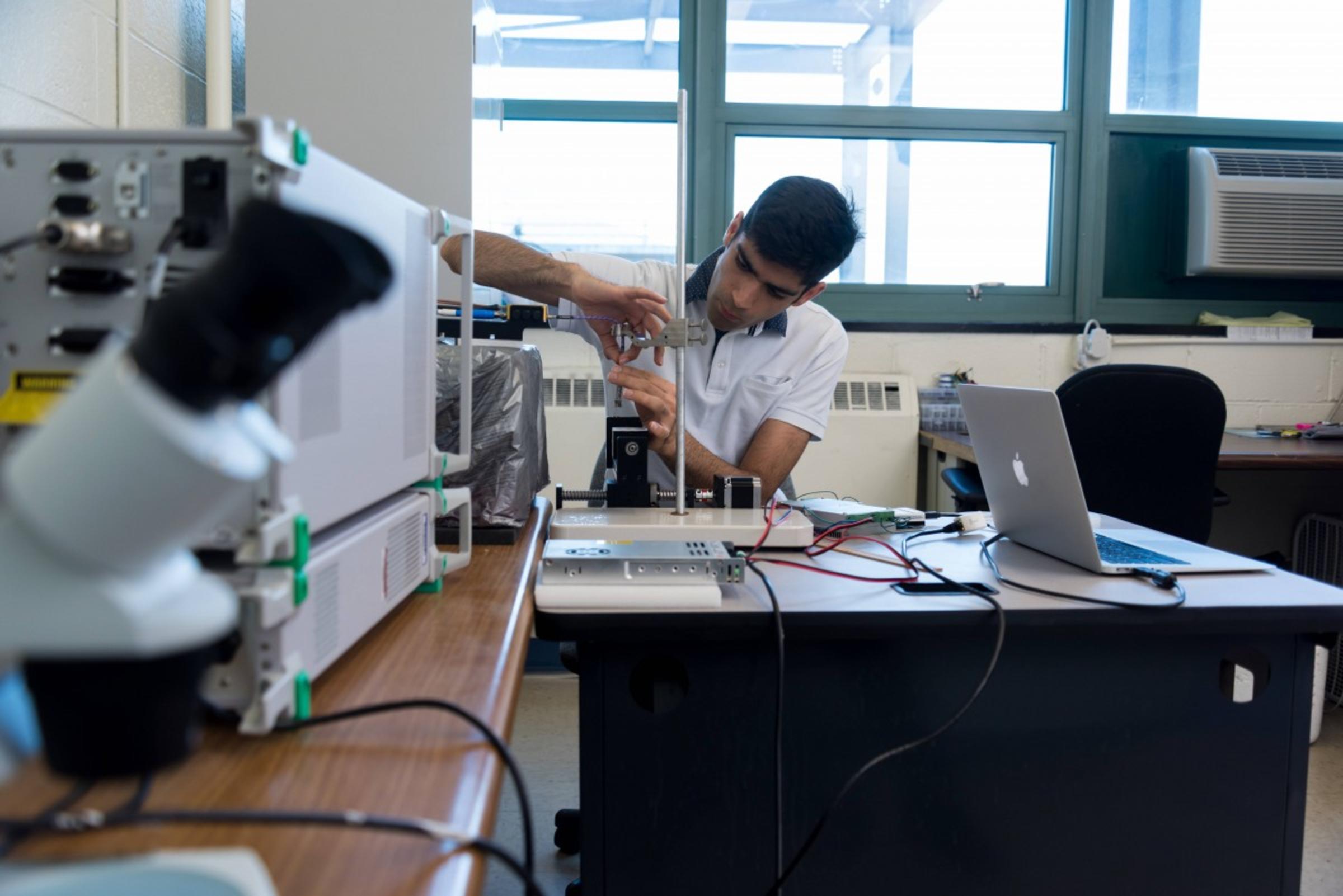 Amir working in the lab