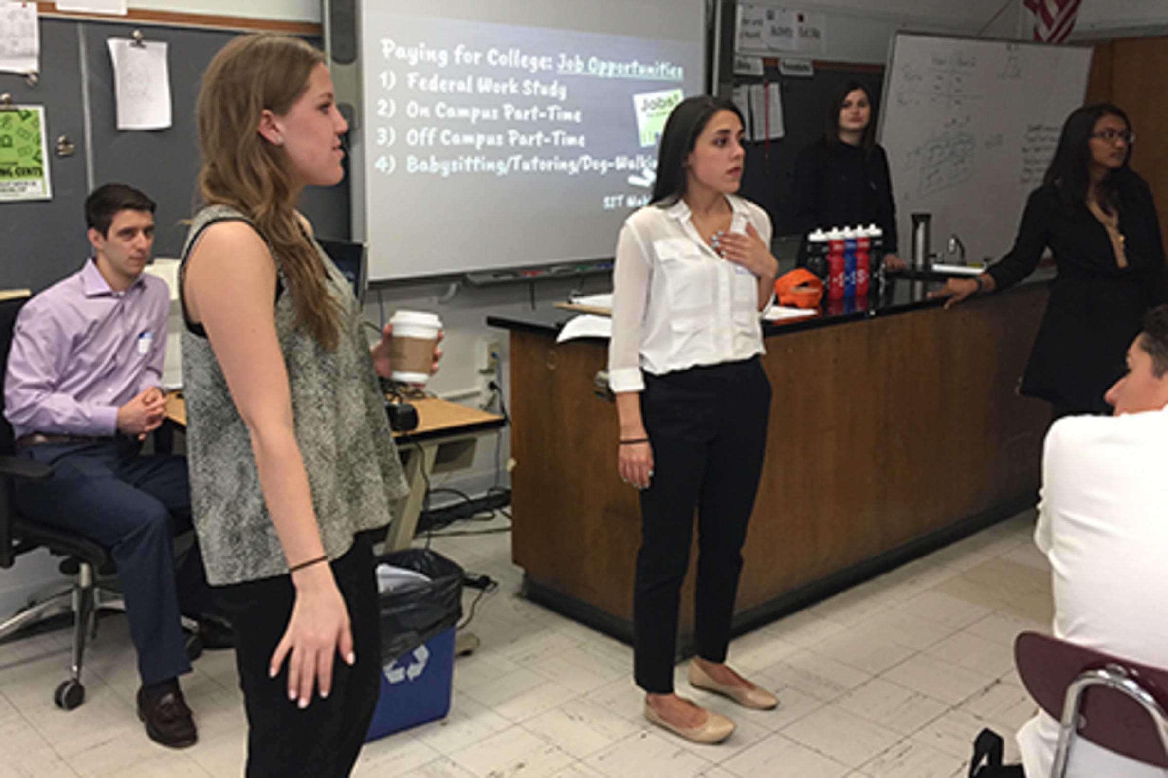 Stevens students lead a Making Cents workshop.