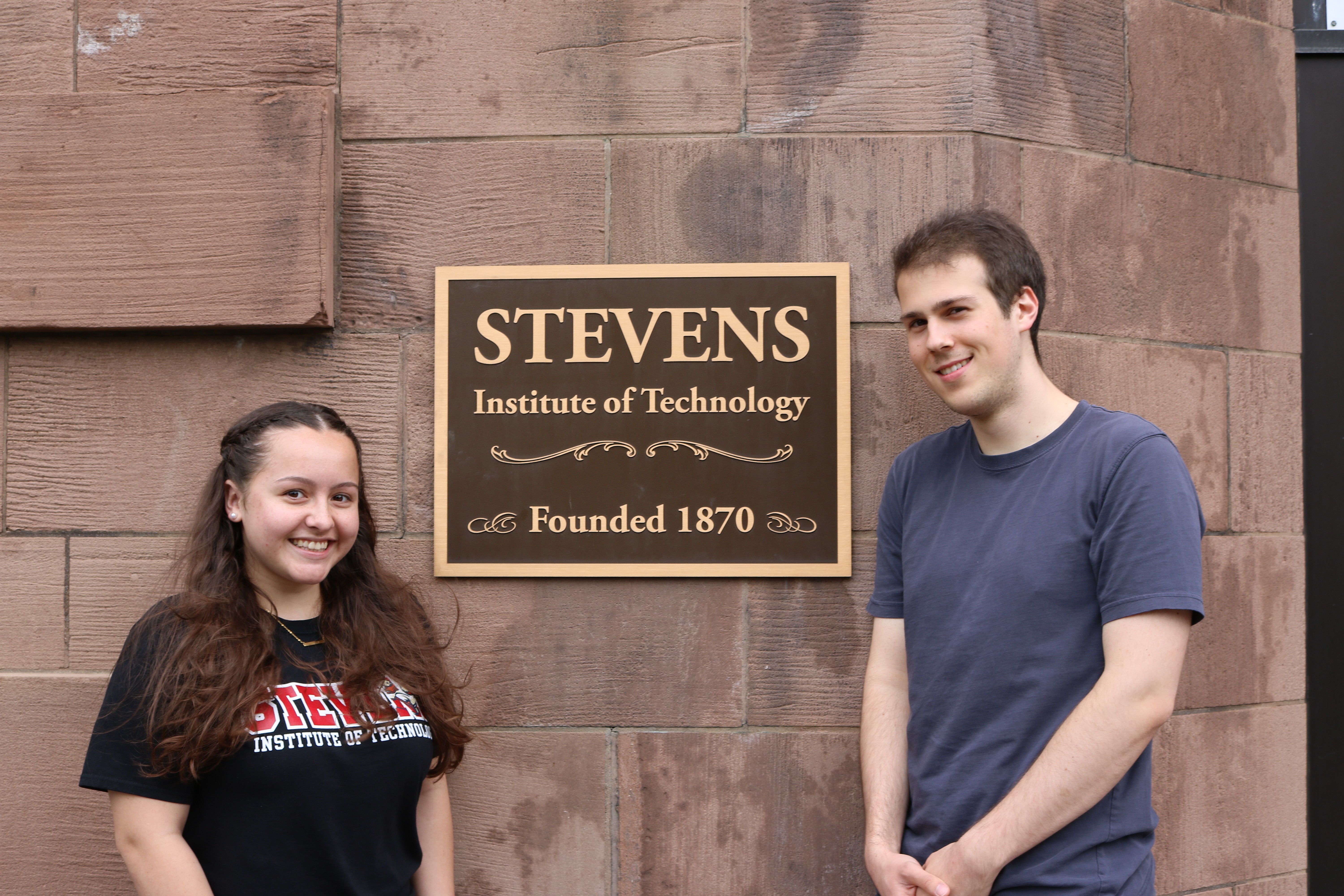 Tsinghua scholarship recipients Mary McNeil and Matthew Falco in front of the Edwin A. Stevens building.