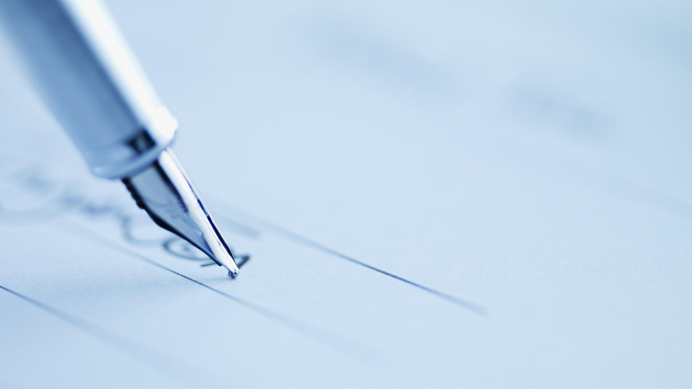 Graphic of a pen on paper