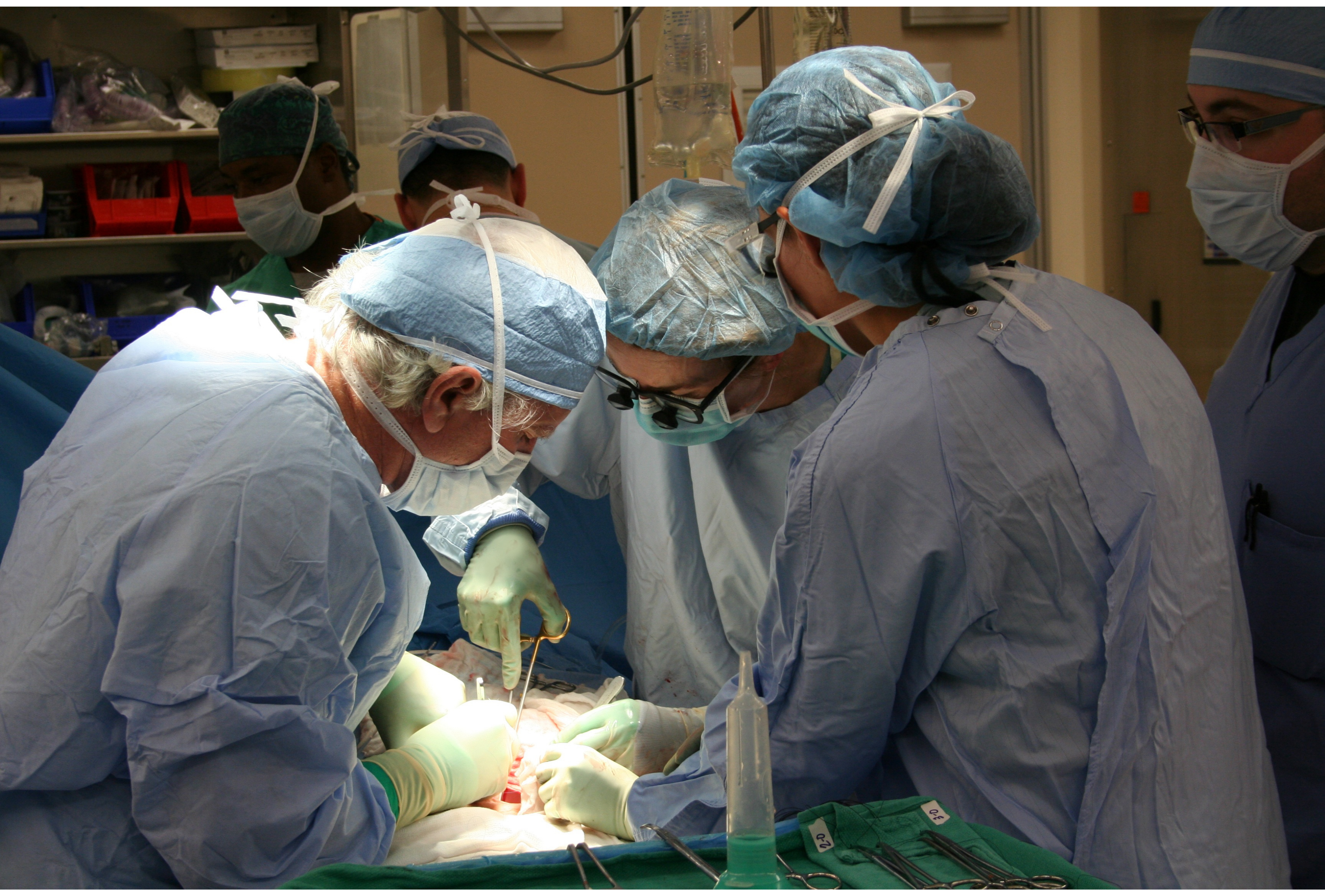 Photos of doctors performing surgery