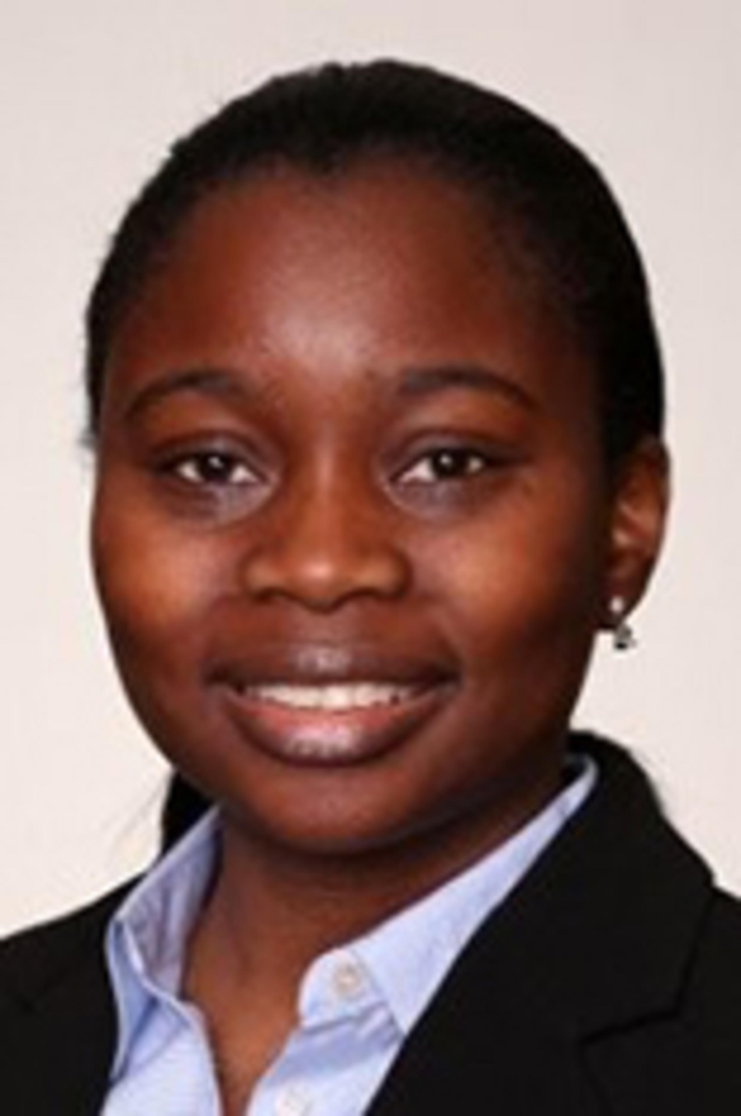 Headshot of Tola Kumolu