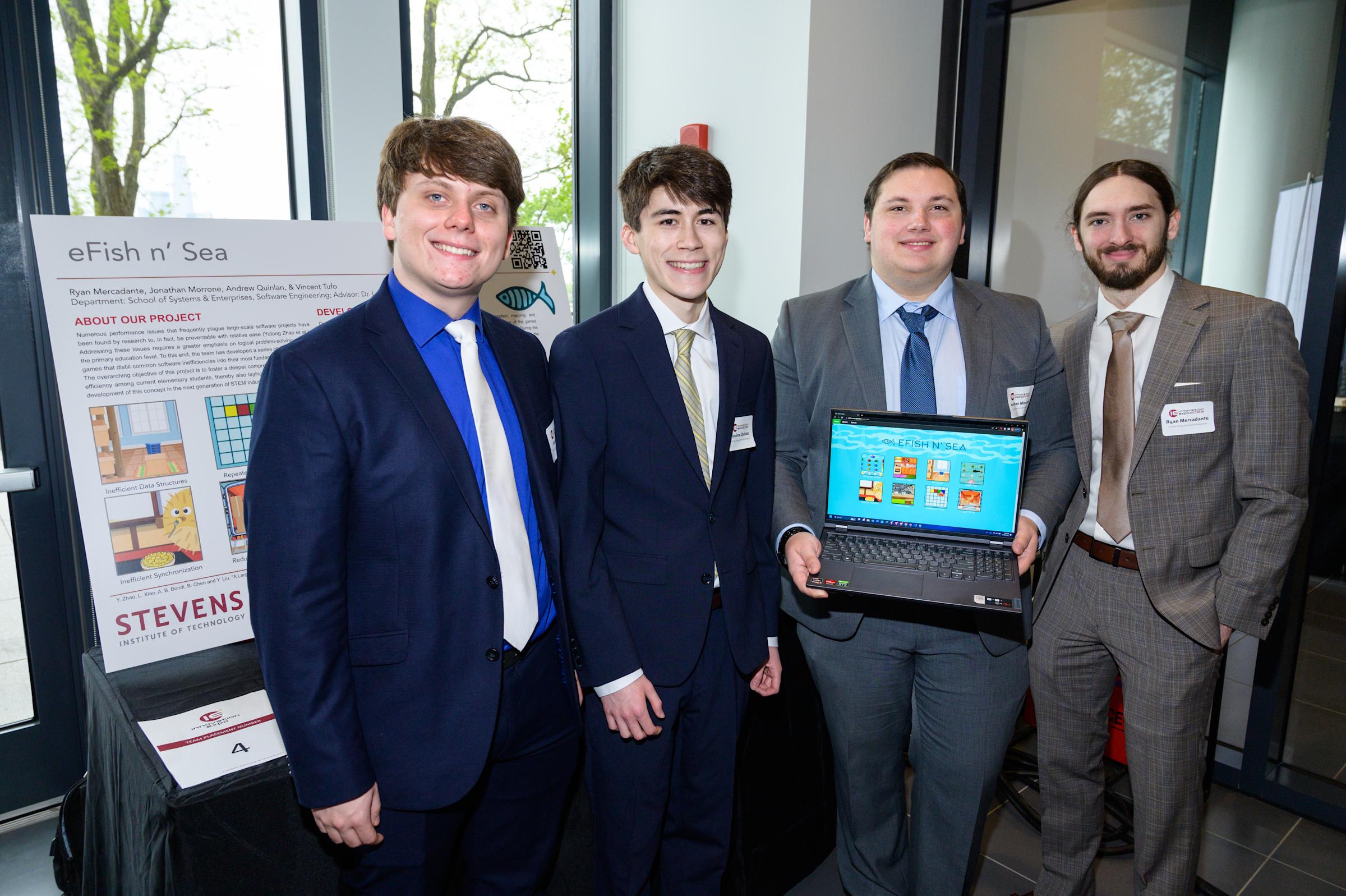 The Software Engineering eFish n' Sea team at the 2023 Innovation Expo. From left to right: Vincent Tufo, Andrew Quinlan, Jonathan Morrone and Ryan Mercadante.