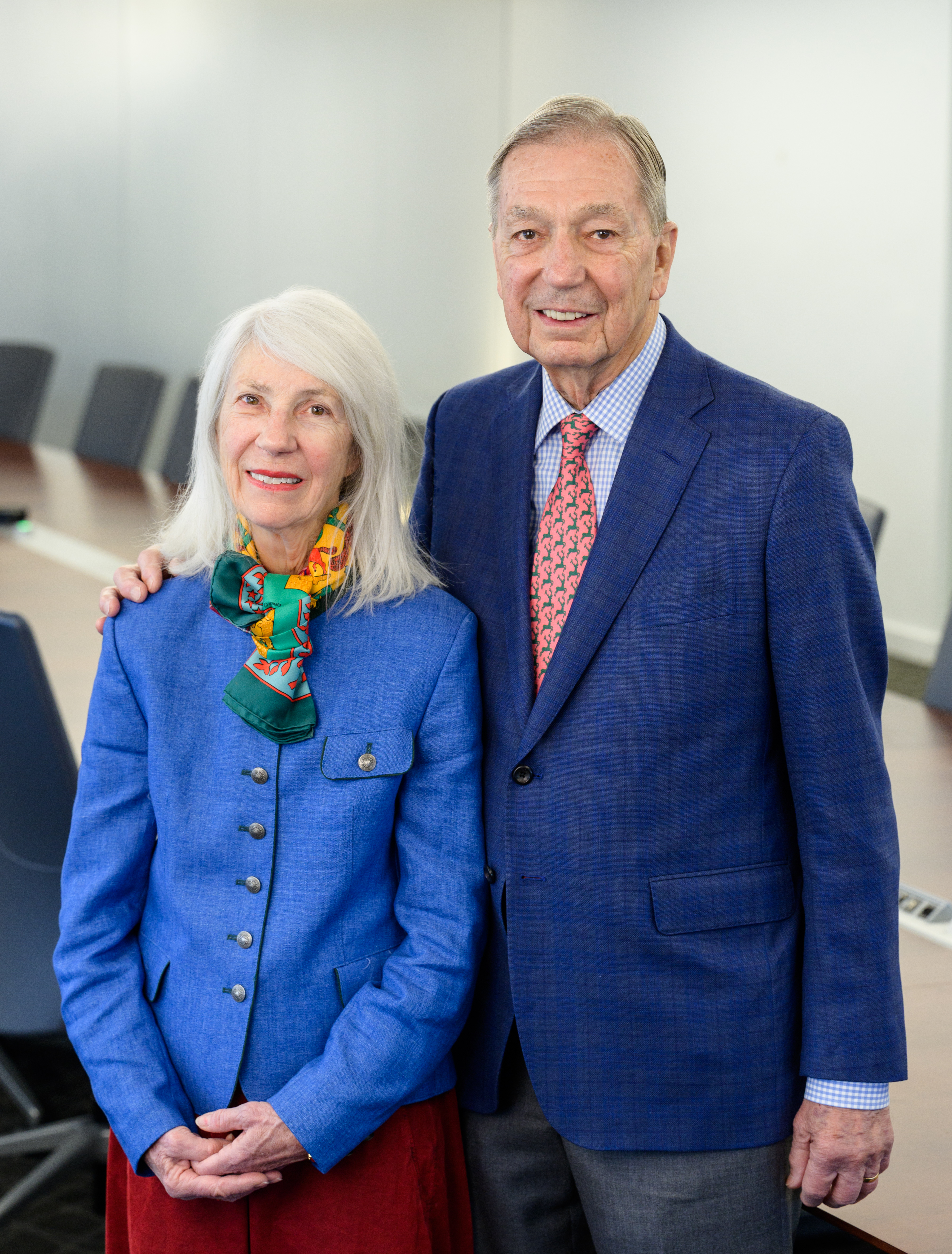 Aimee and Michael Kakos post for a portrait