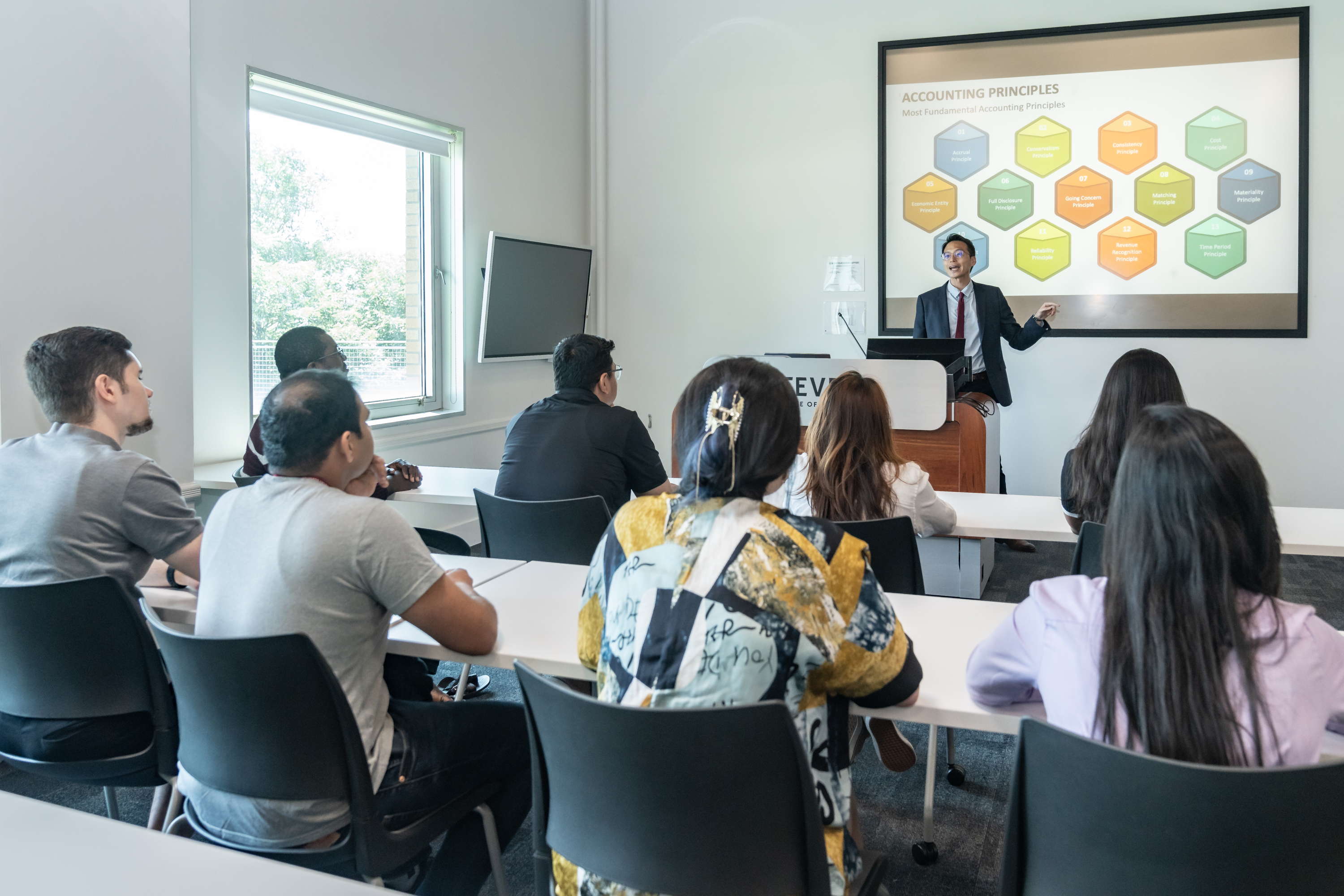 Professor teaching in classroom