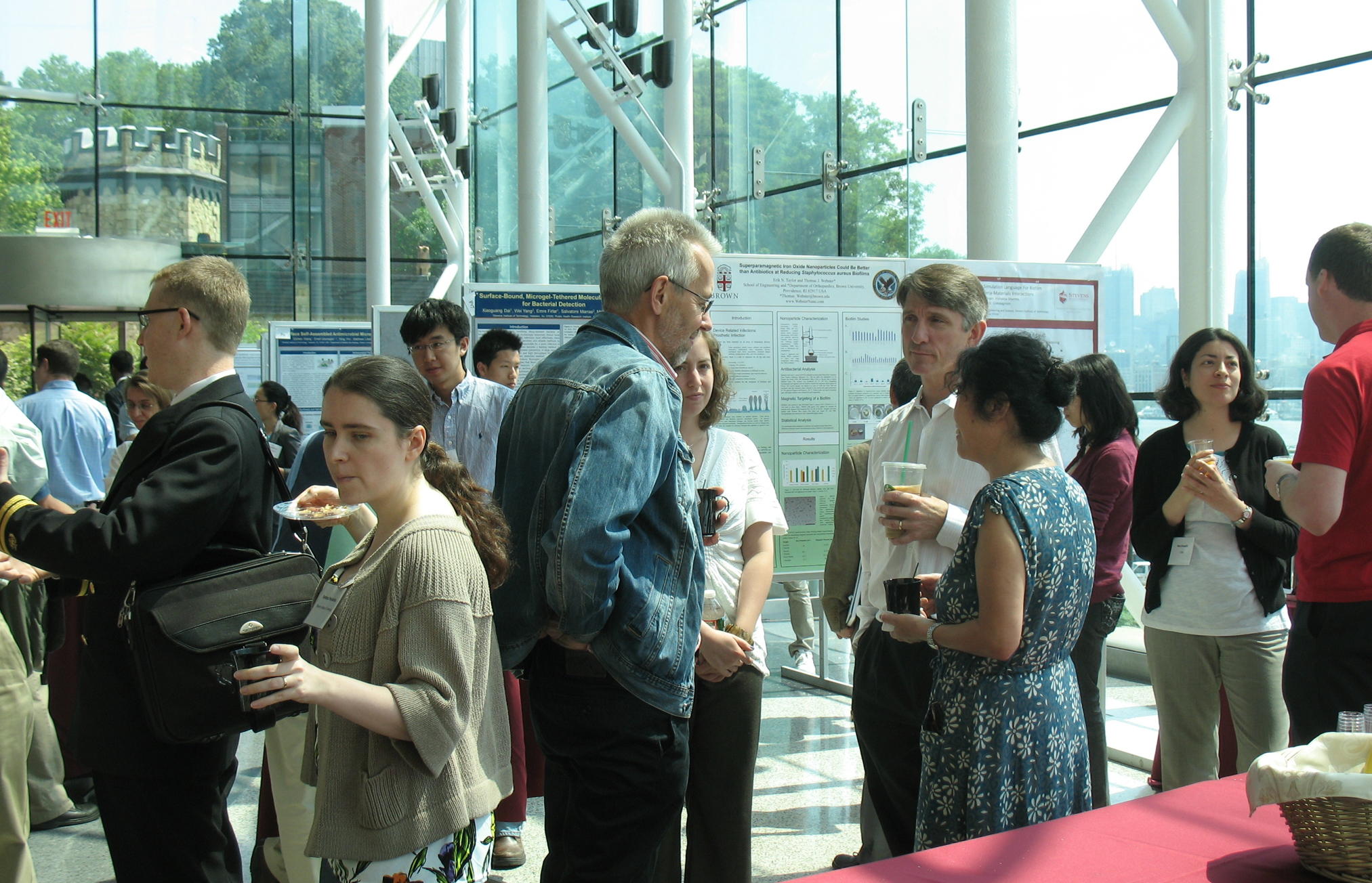 attendees at the first Stevens Conference on Bacteria-Material Interactions poster session