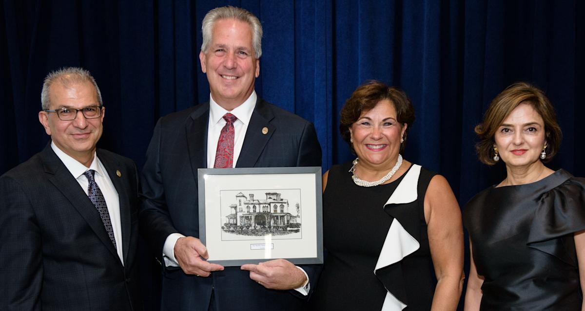 President Nariman Farvardin and Hoveida stand with alumni to recognize their generosity to Stevens