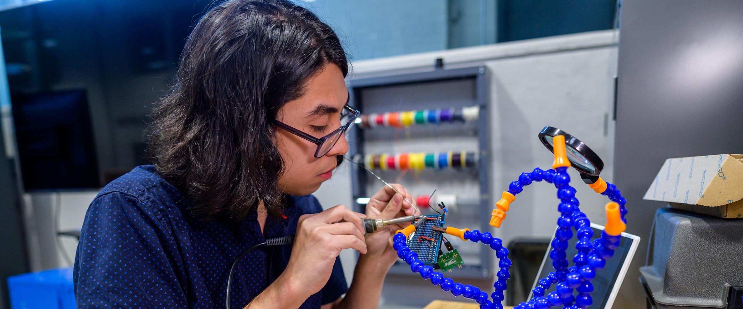 Student working in the Maker Center.