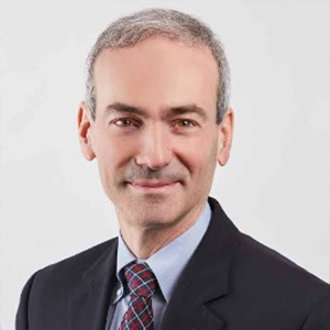 Headshot of Paul Glasserman wearing professional attire.
