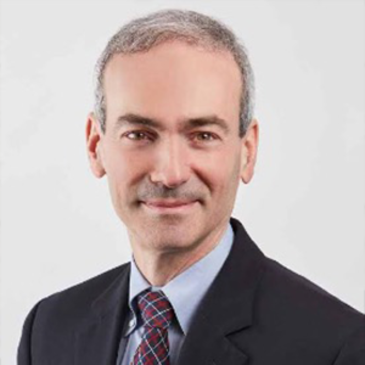 Headshot of Paul Glasserman wearing professional attire.