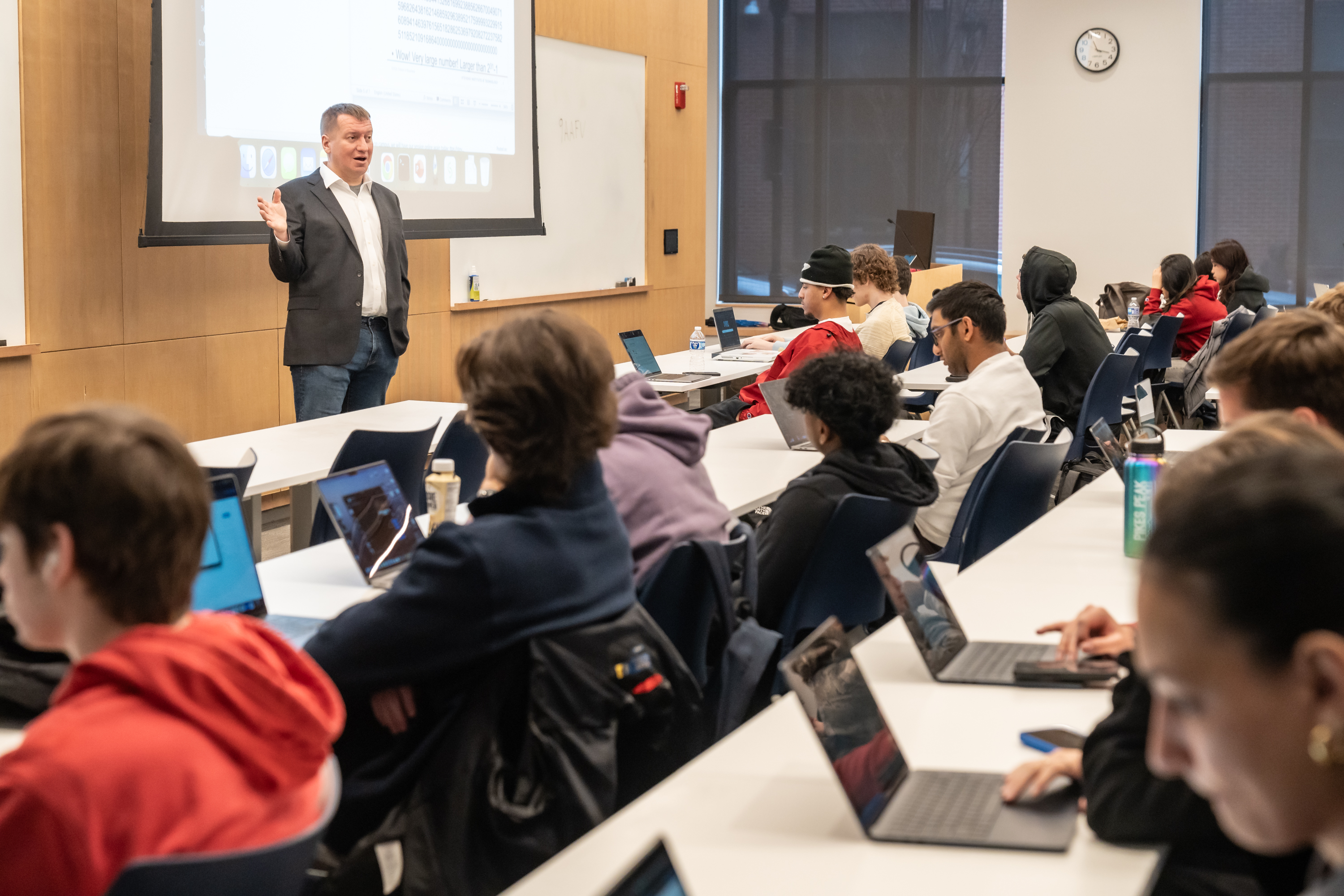 Professor Aaltonen teaching students in a classroom