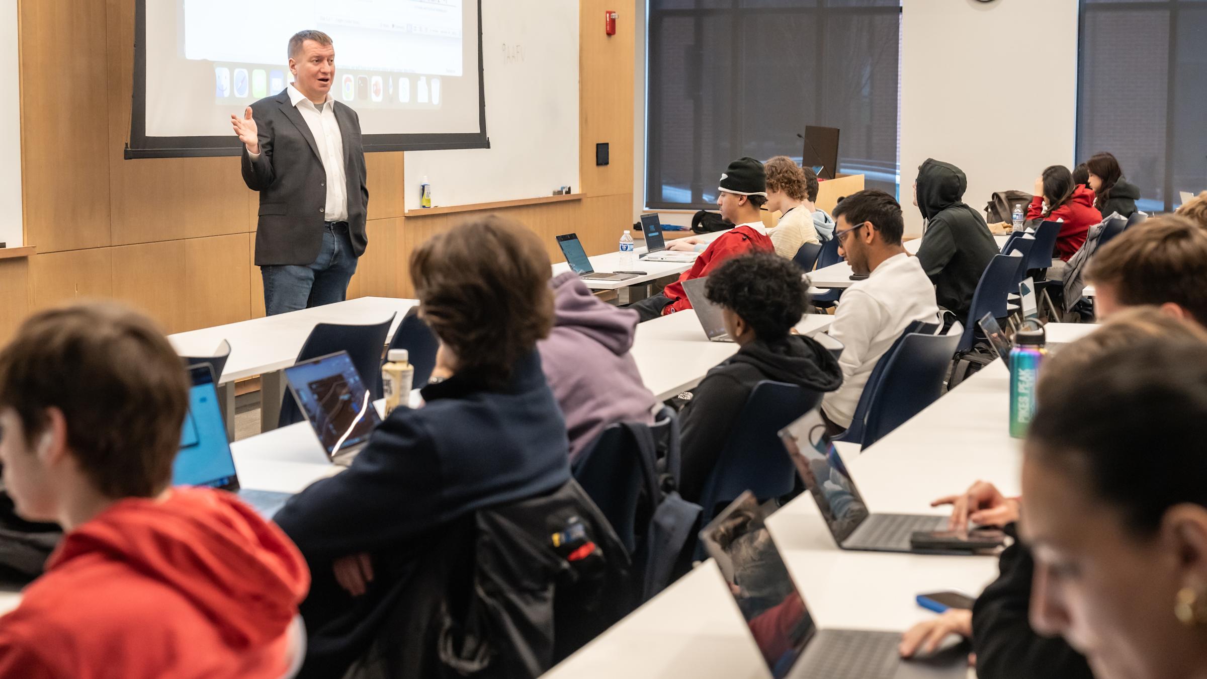 Professor Aaltonen teaching students in a classroom