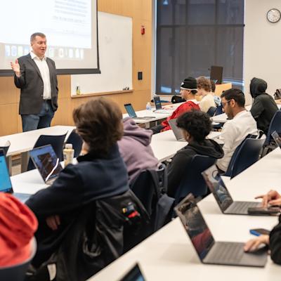 Professor Aaltonen teaching students in a classroom