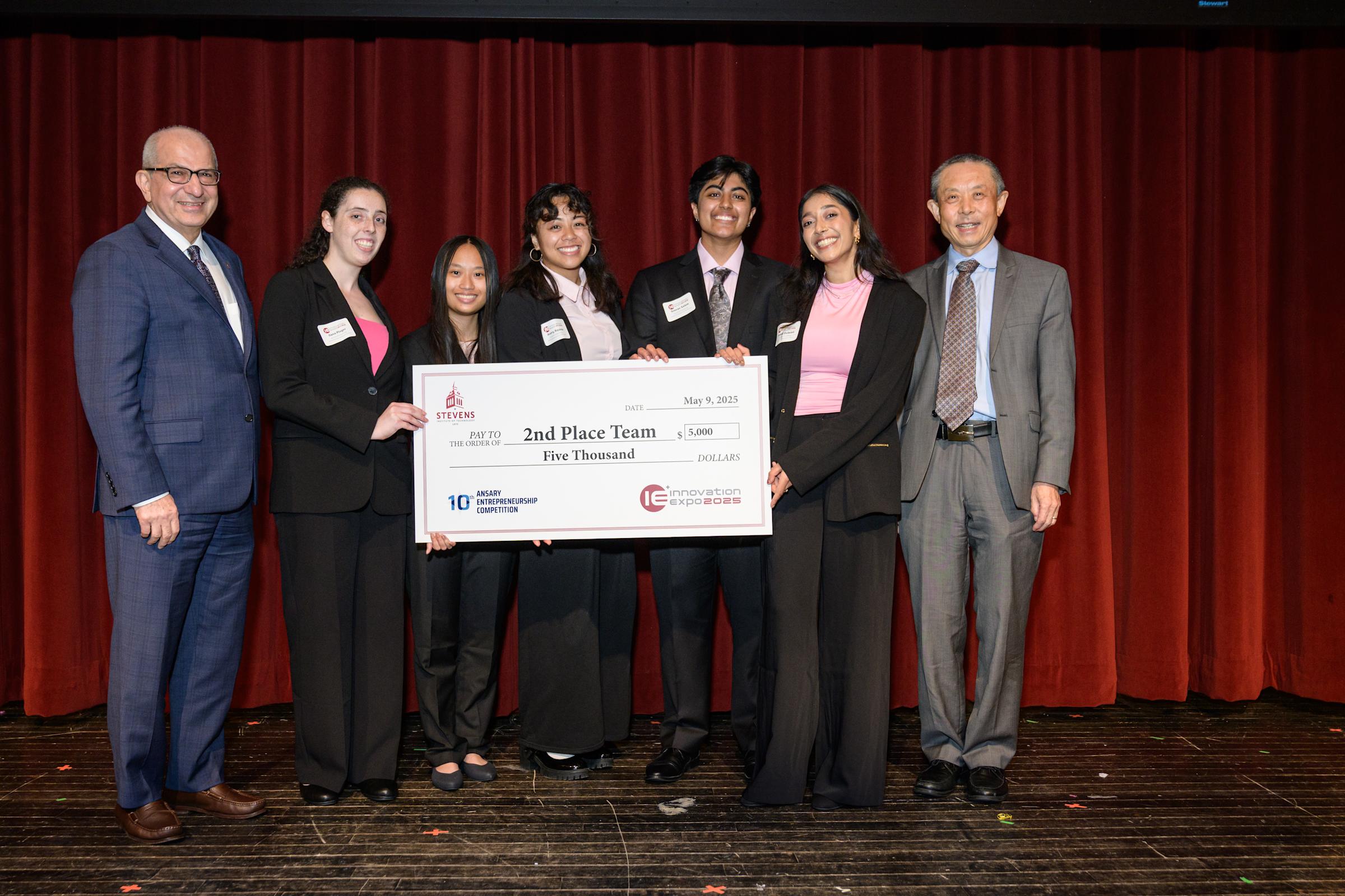 DensiSense accepts its prize