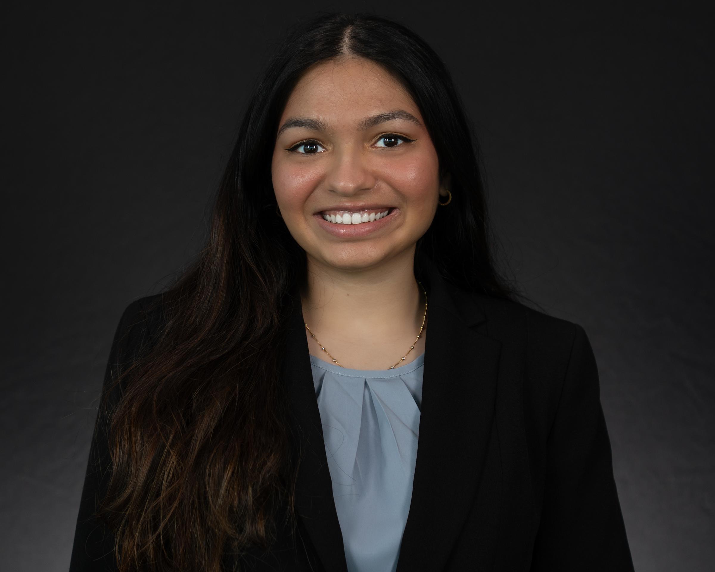 Headshot of Satwika Kota wearing professional attire.