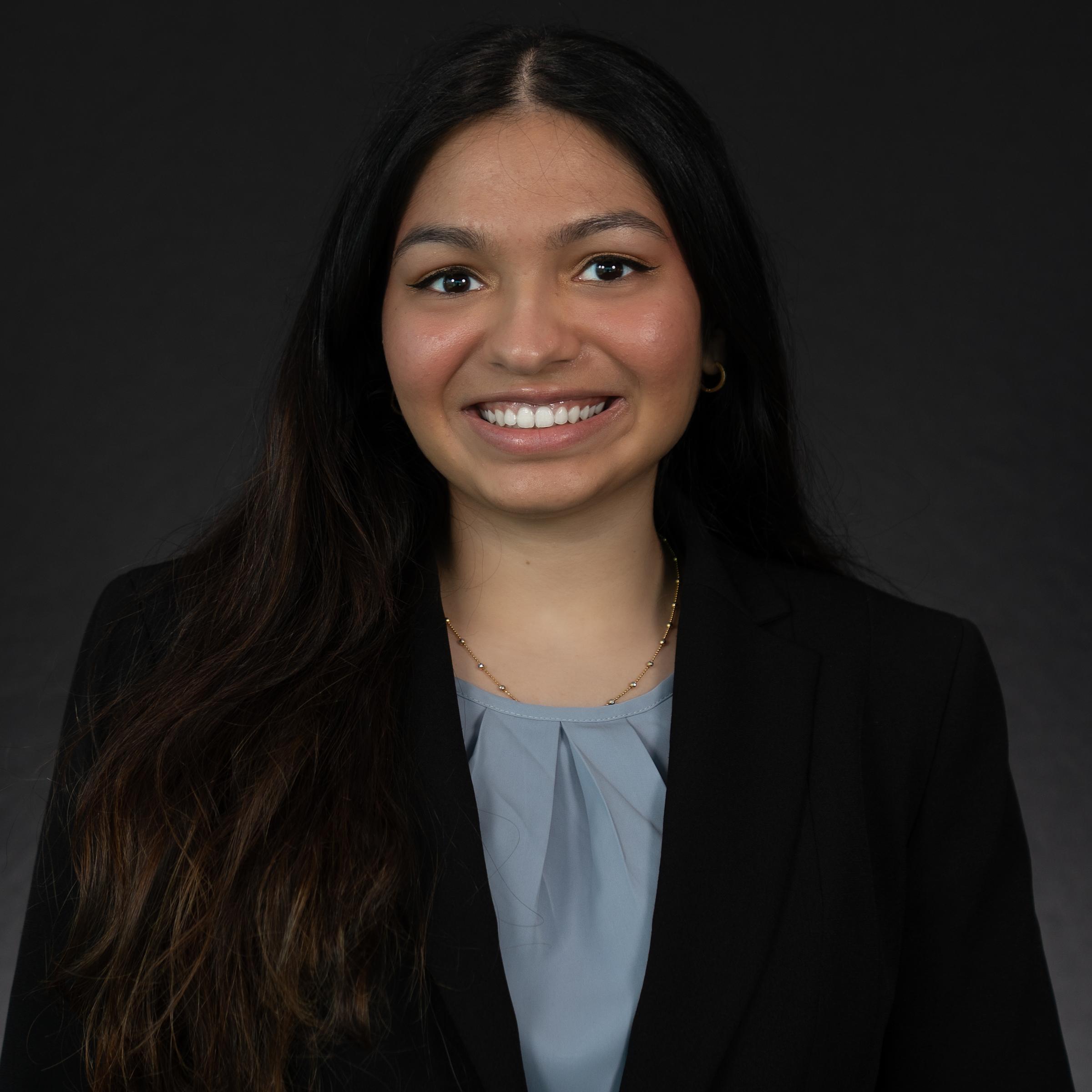 Headshot of Satwika Kota wearing professional attire.
