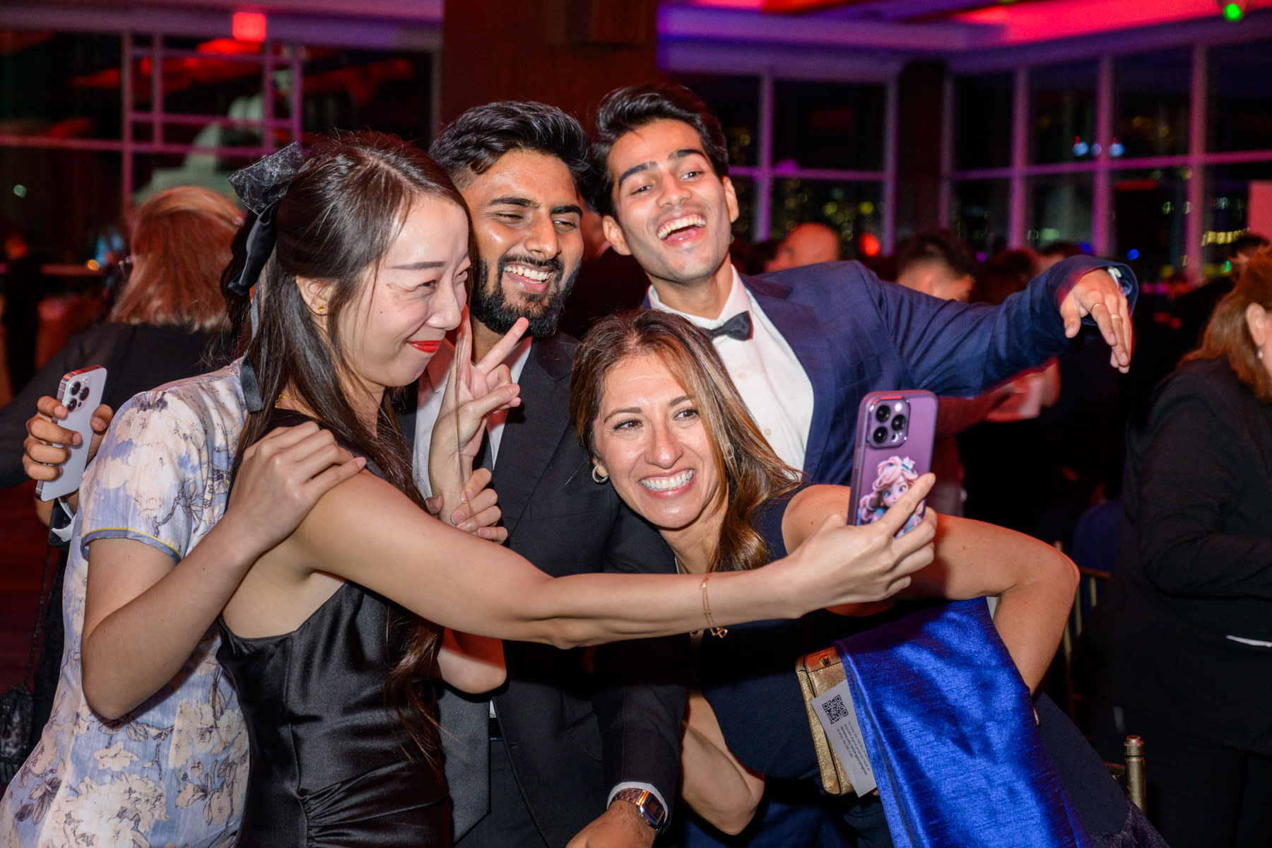 A group of friends takes a selfie at the 2024 Stevens Awards Gala.
