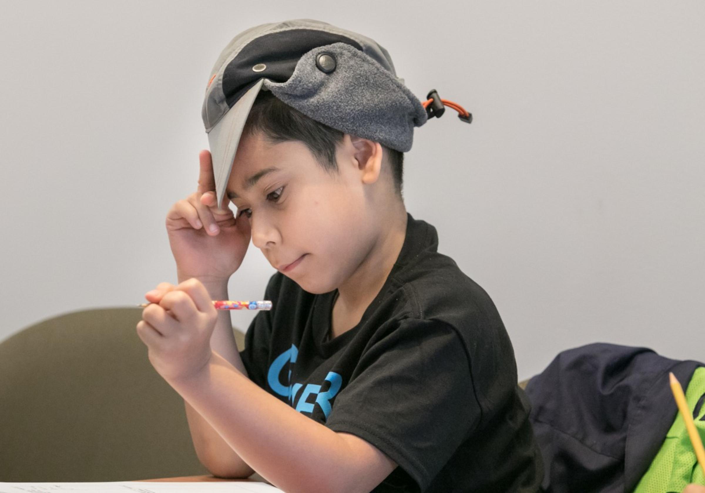 A young boy in a classroom