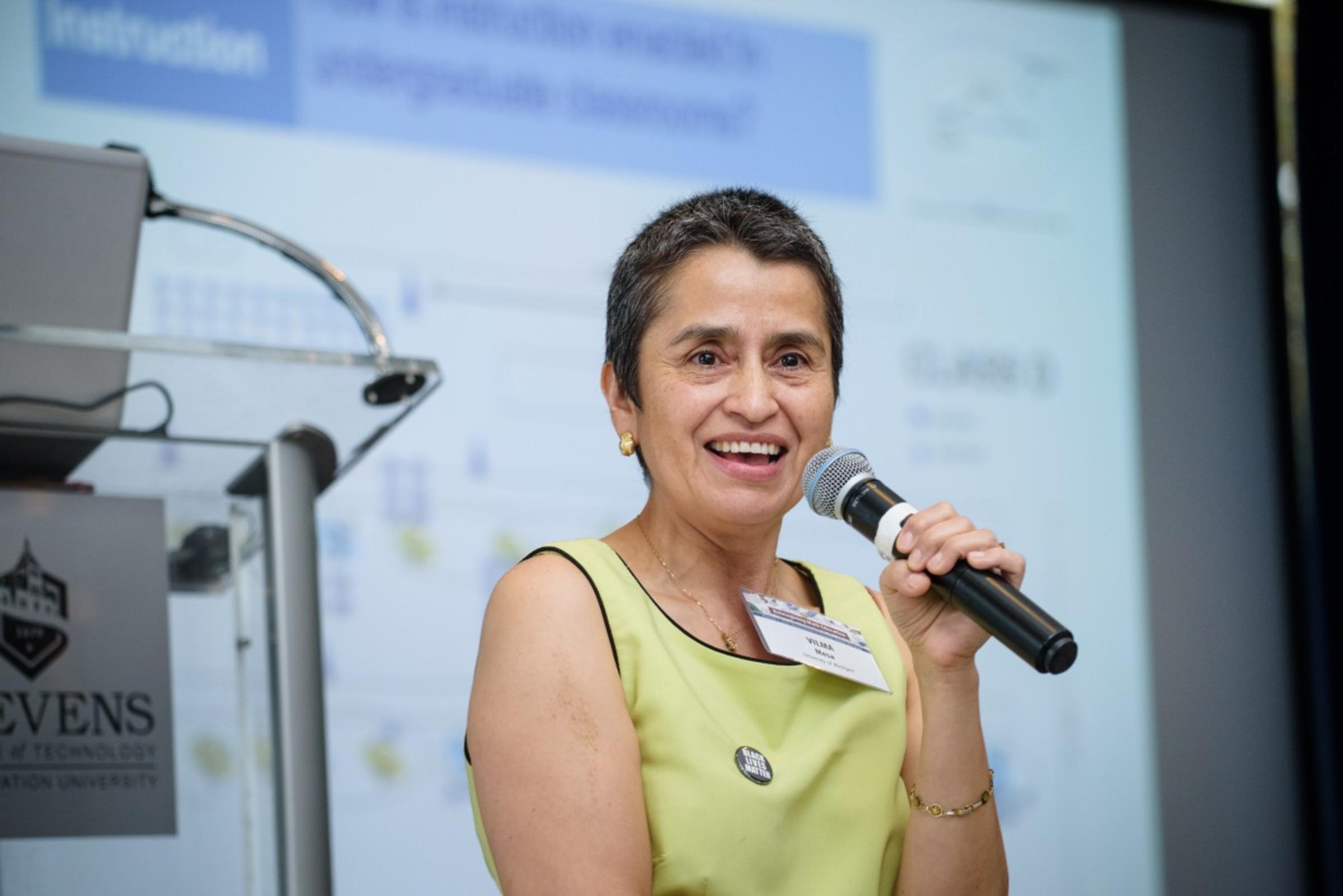 Vilma Mesa speaking at the Reimagining Math Education conference. CREDIT: Jeff Vock