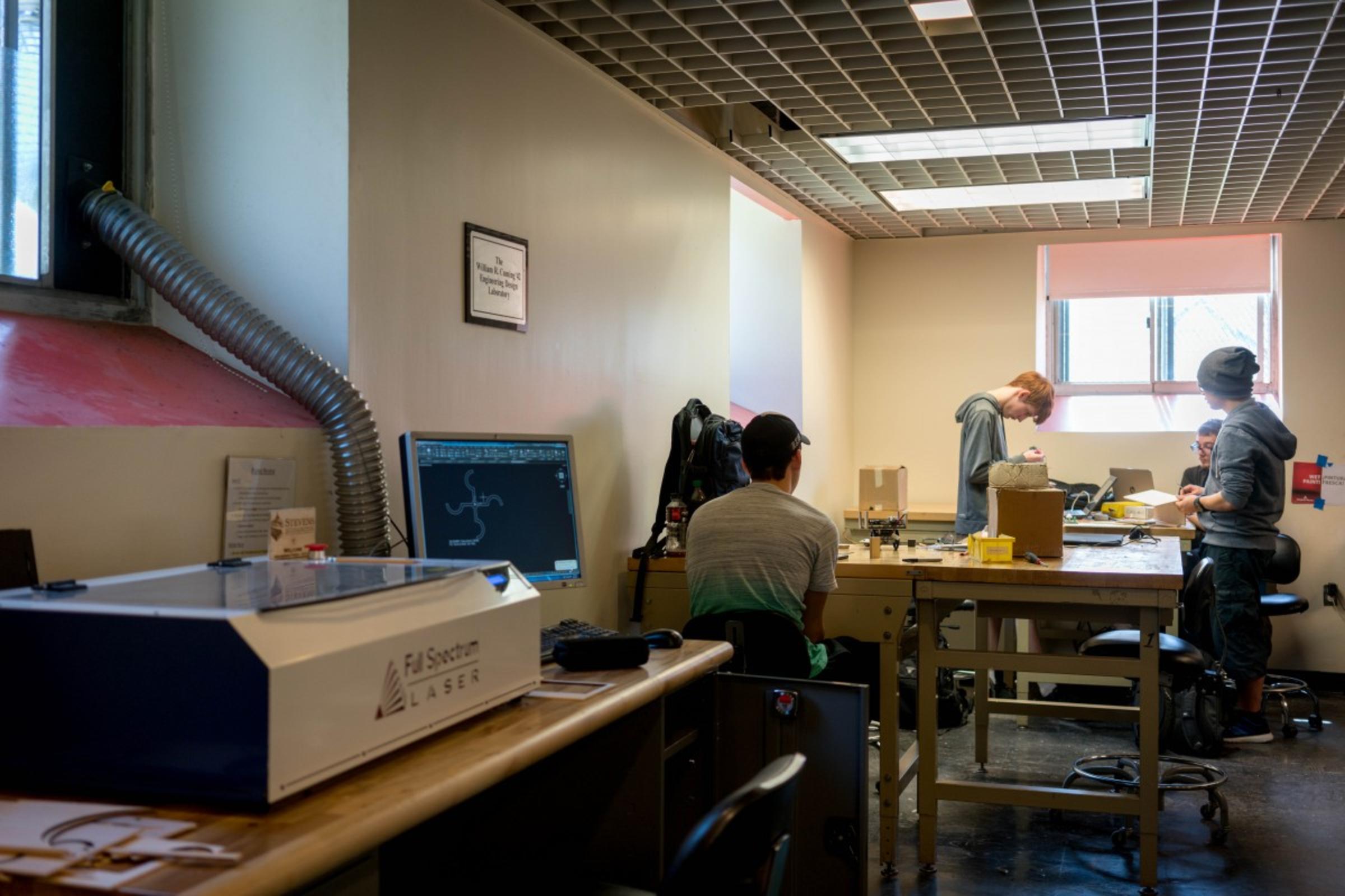 Students working on design spine projects