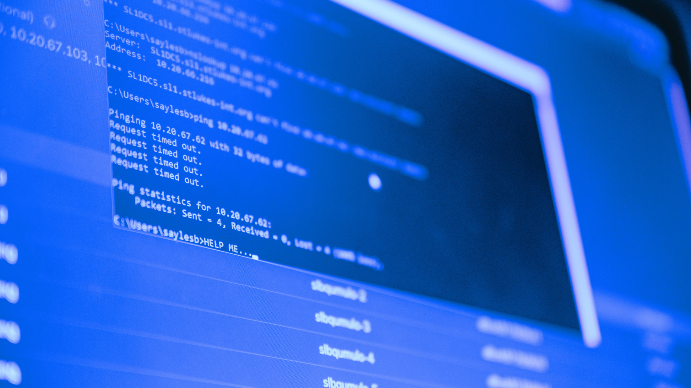 A bottom angle of a computer programming screen with coding.
