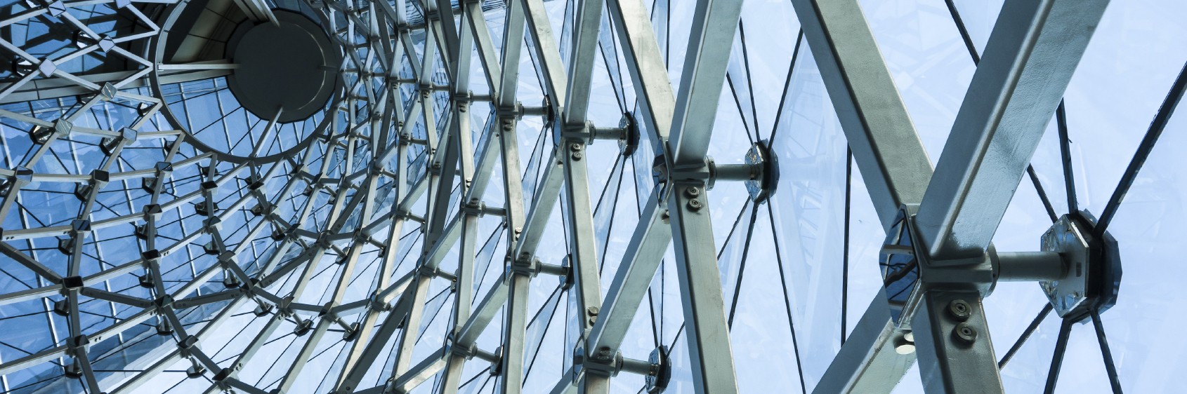 Image of glass and metal structure representative of systems