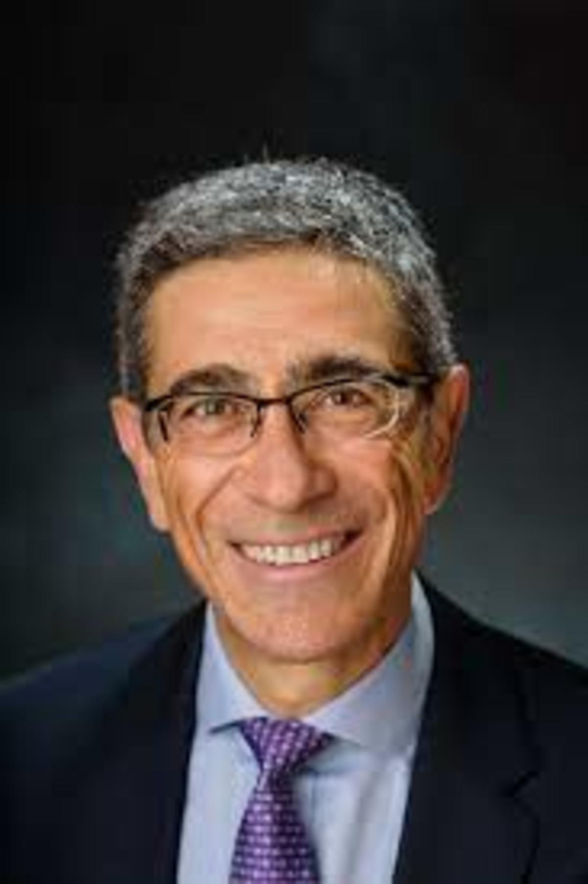 Headshot of Carlo