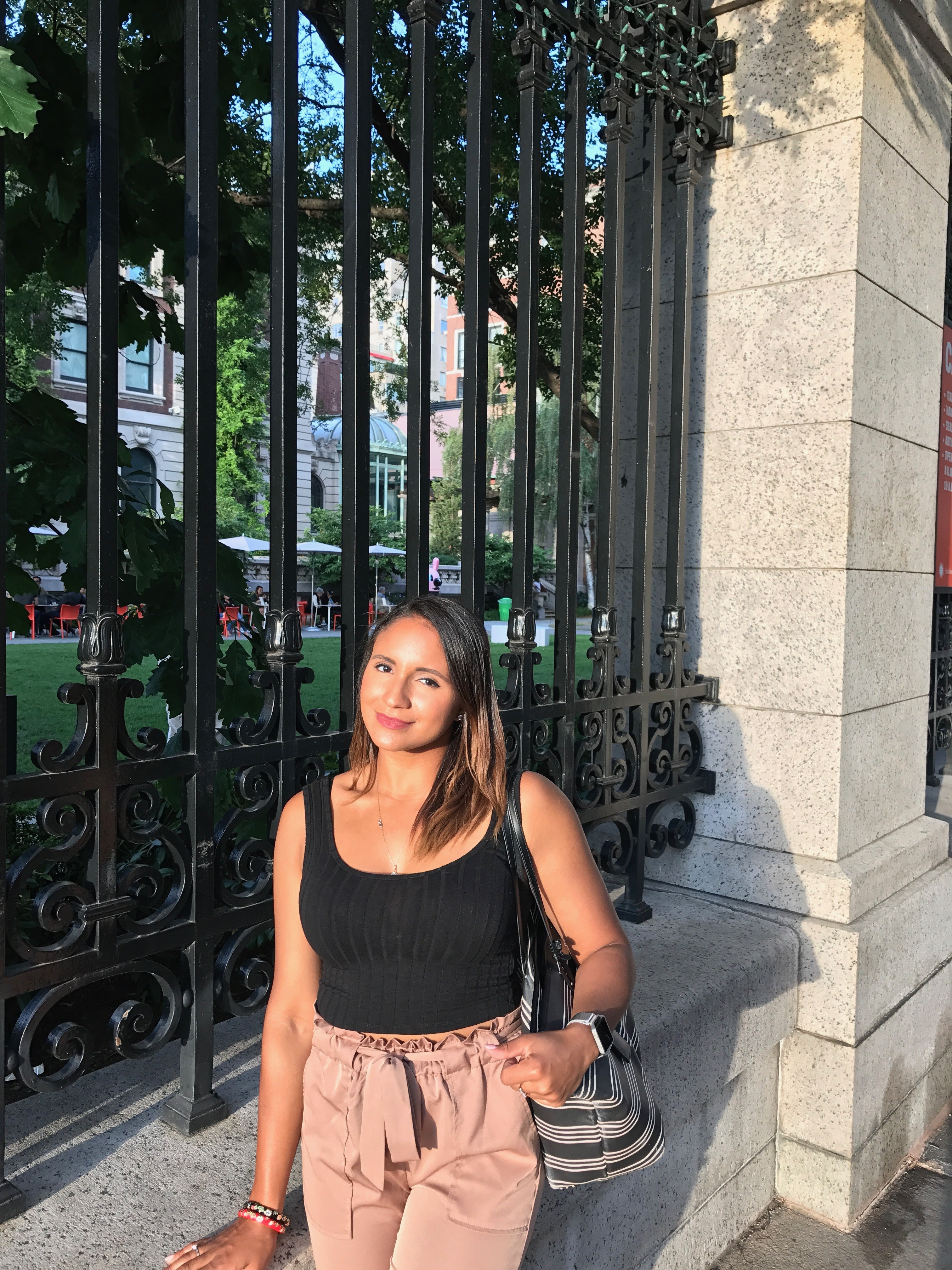 Yonaida Brito standing outside the Cooper Hewitt Smithsonian Design Museum in New York City