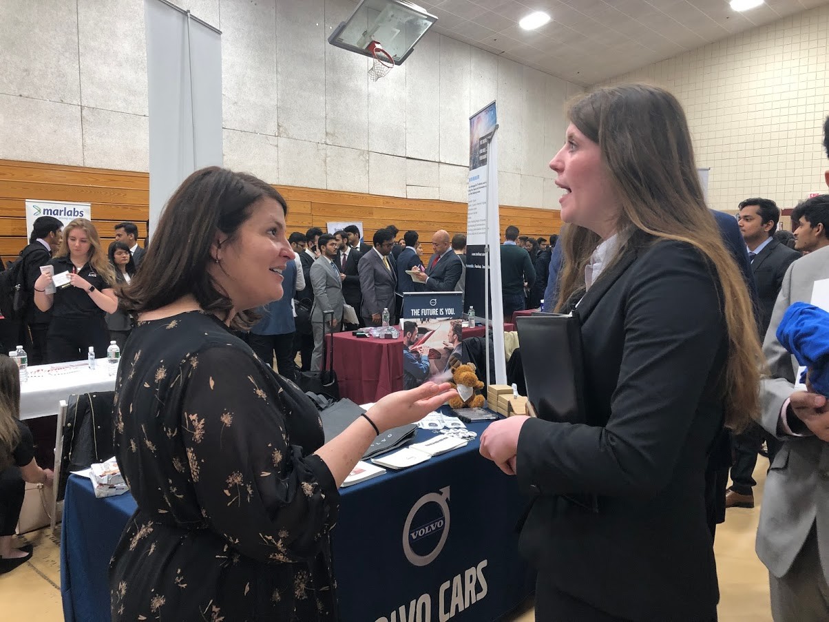 Volvo recruiter speaking with a Stevens student