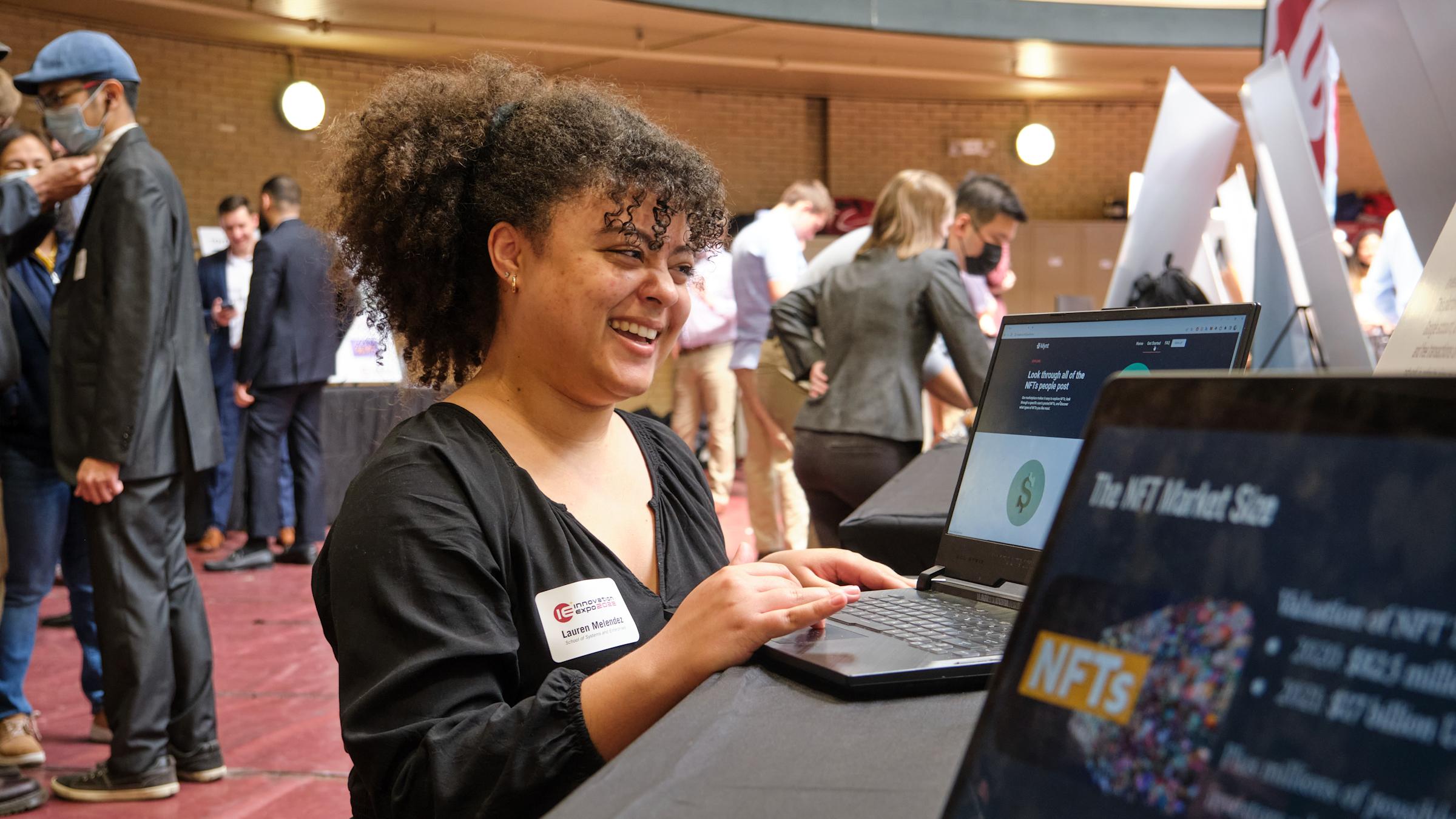 Student using laptop.