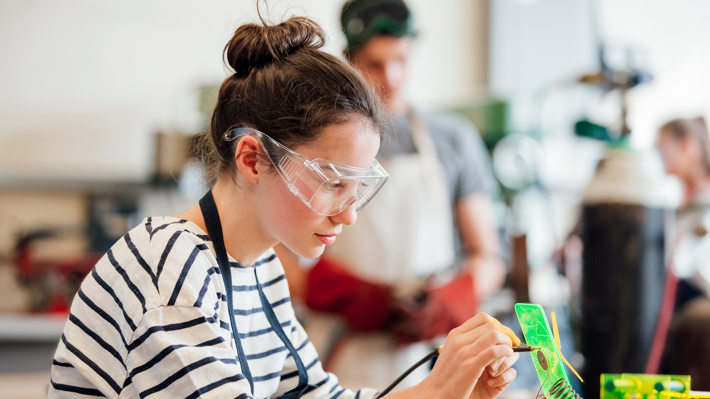 Girl in engineering classroom