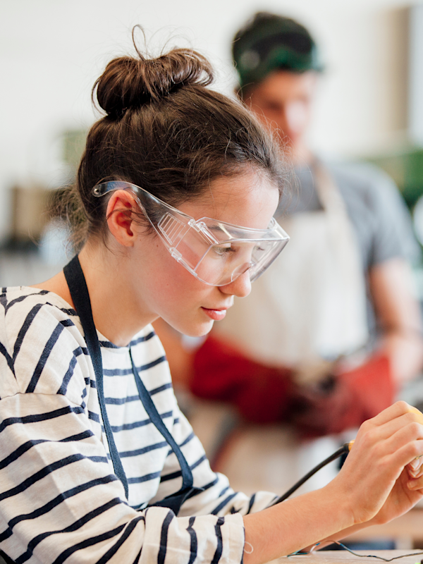 Girl in engineering classroom