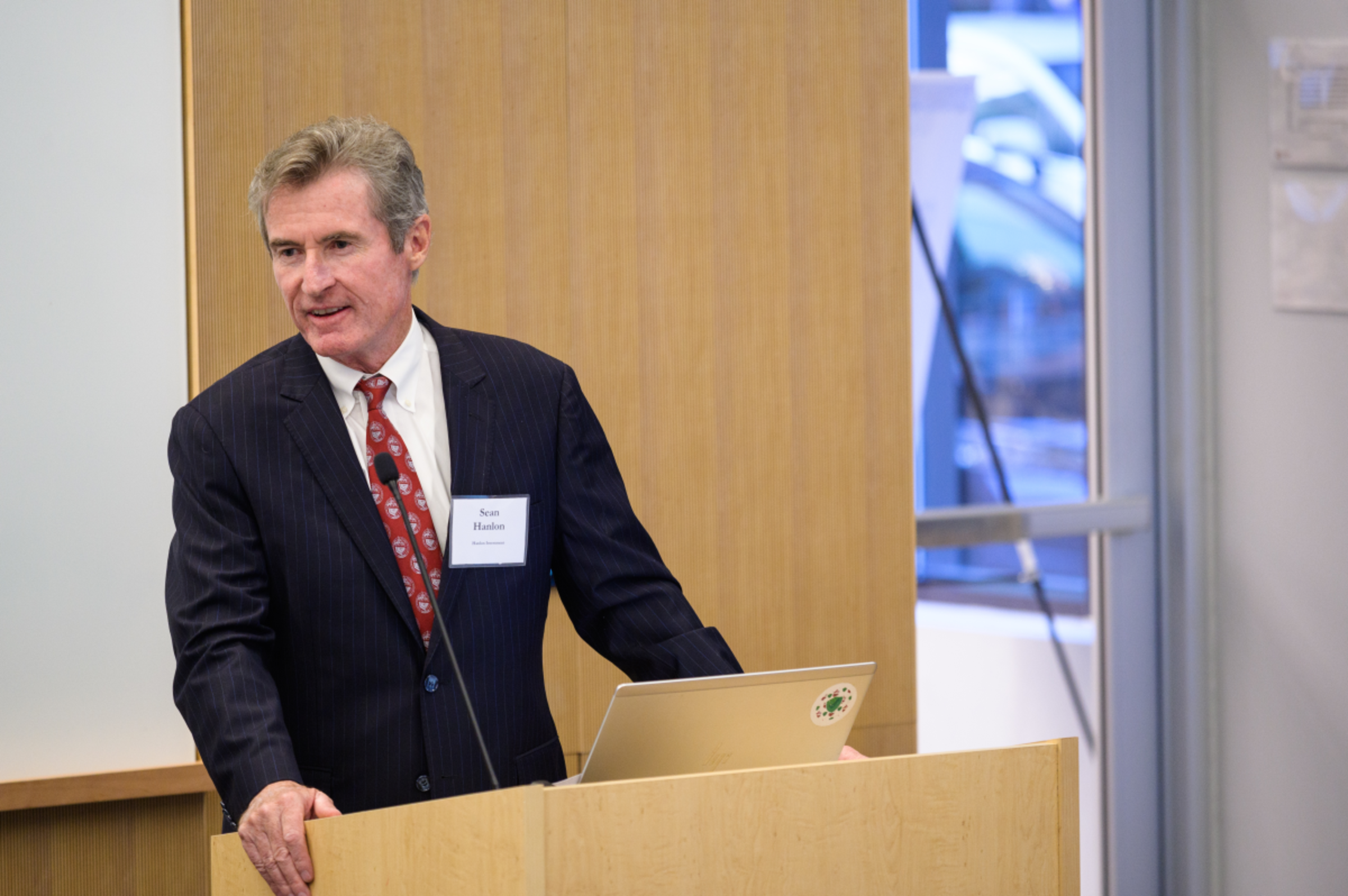 male speaker at podium