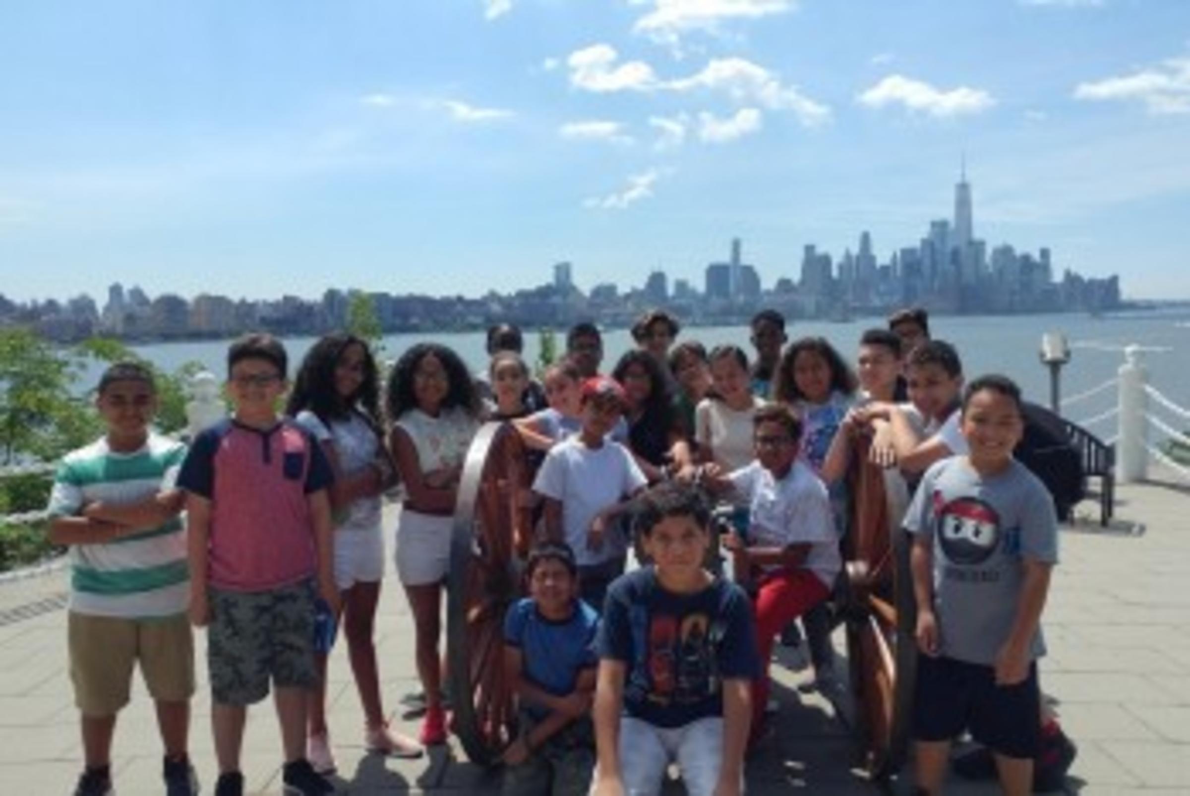 Middle school students standing outside