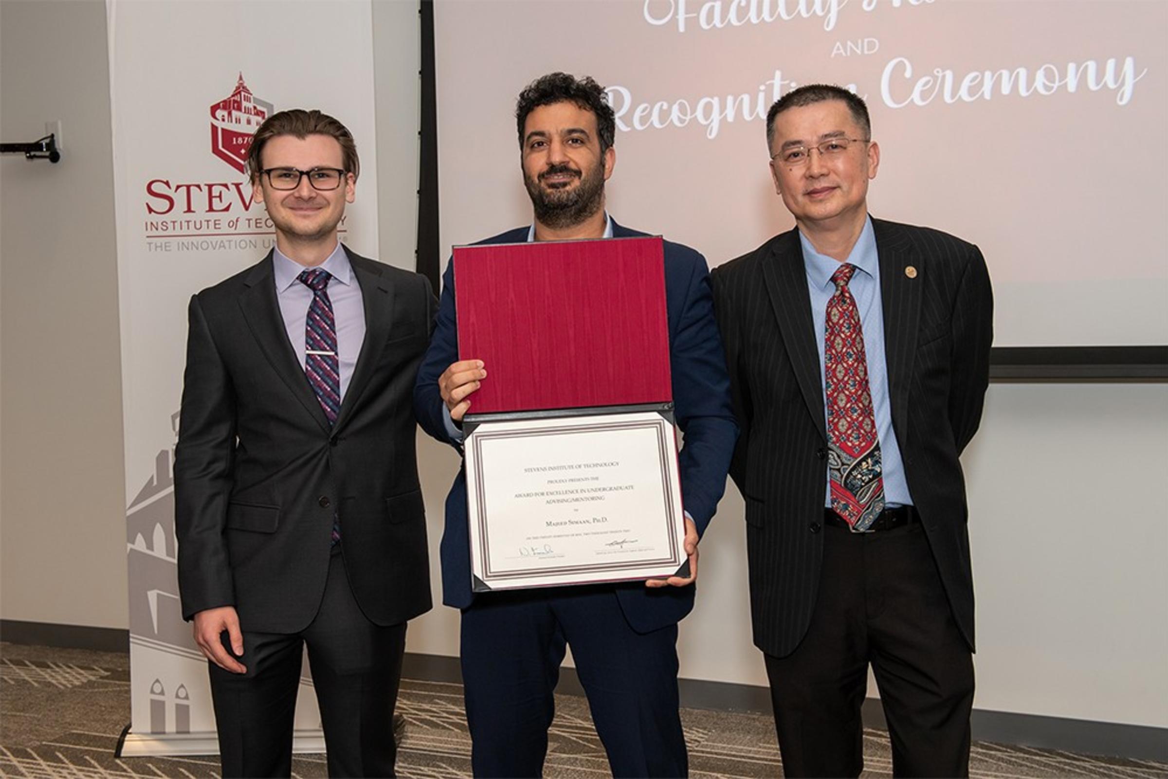 Leonid Maksymenko, Majeed Simaan, David Zeng standing