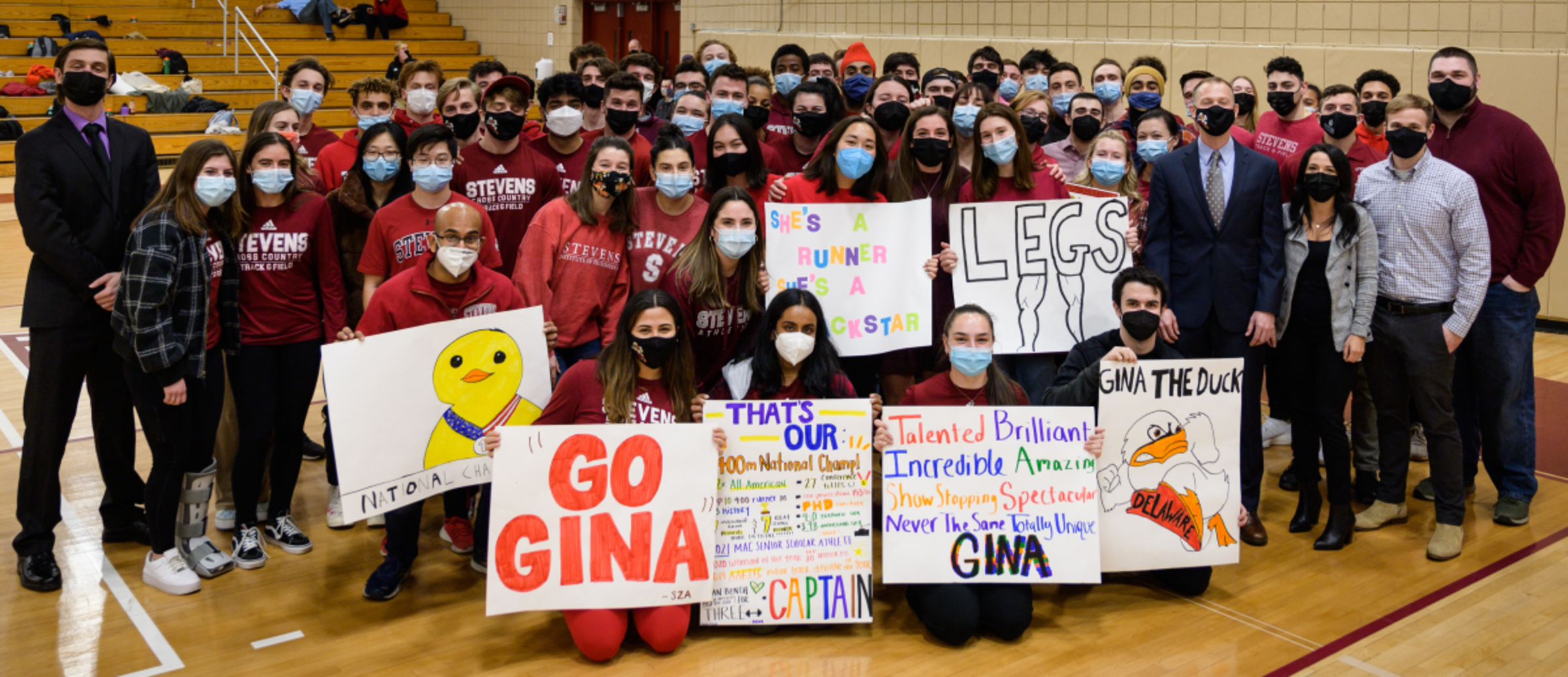 group of students with signs class=