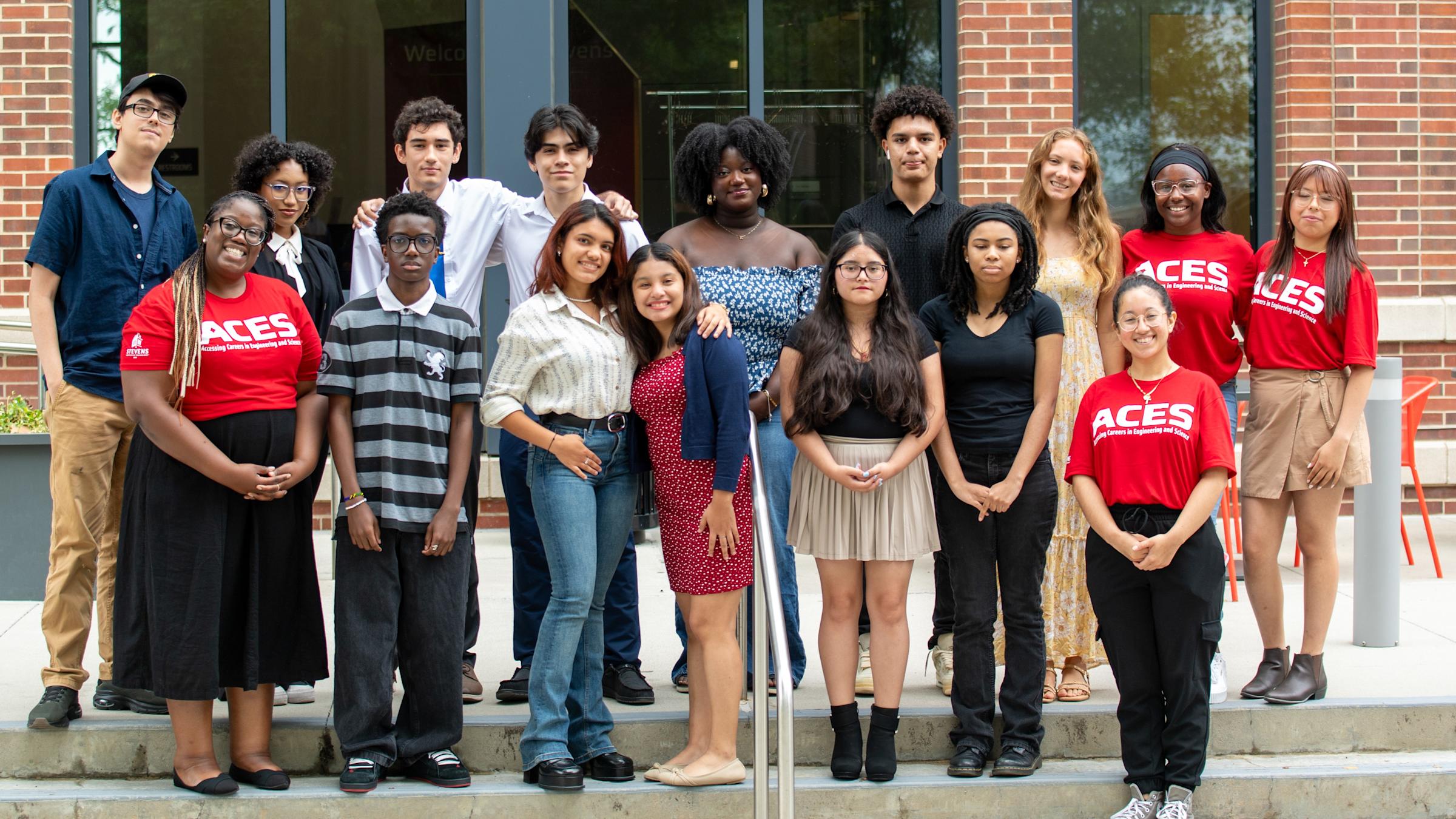 A group of people stand in front of a building.