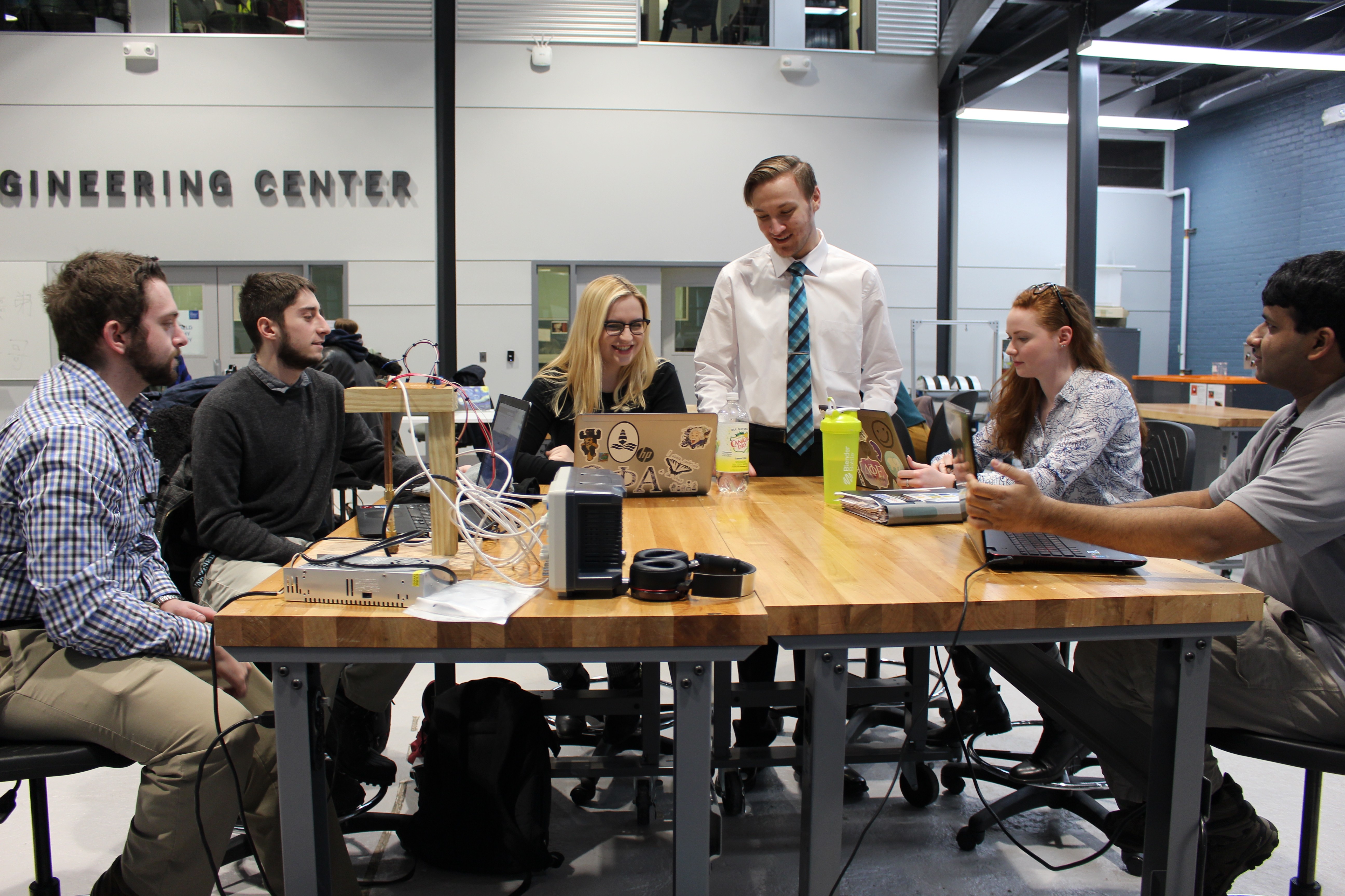From left to right: team members James Furrer, Jonathan Bobkov, Dana Roe, Nicholas Sorrentino, Ann Collins ME and Arjun Krishna gather at the ABS Engineering Center at Stevens